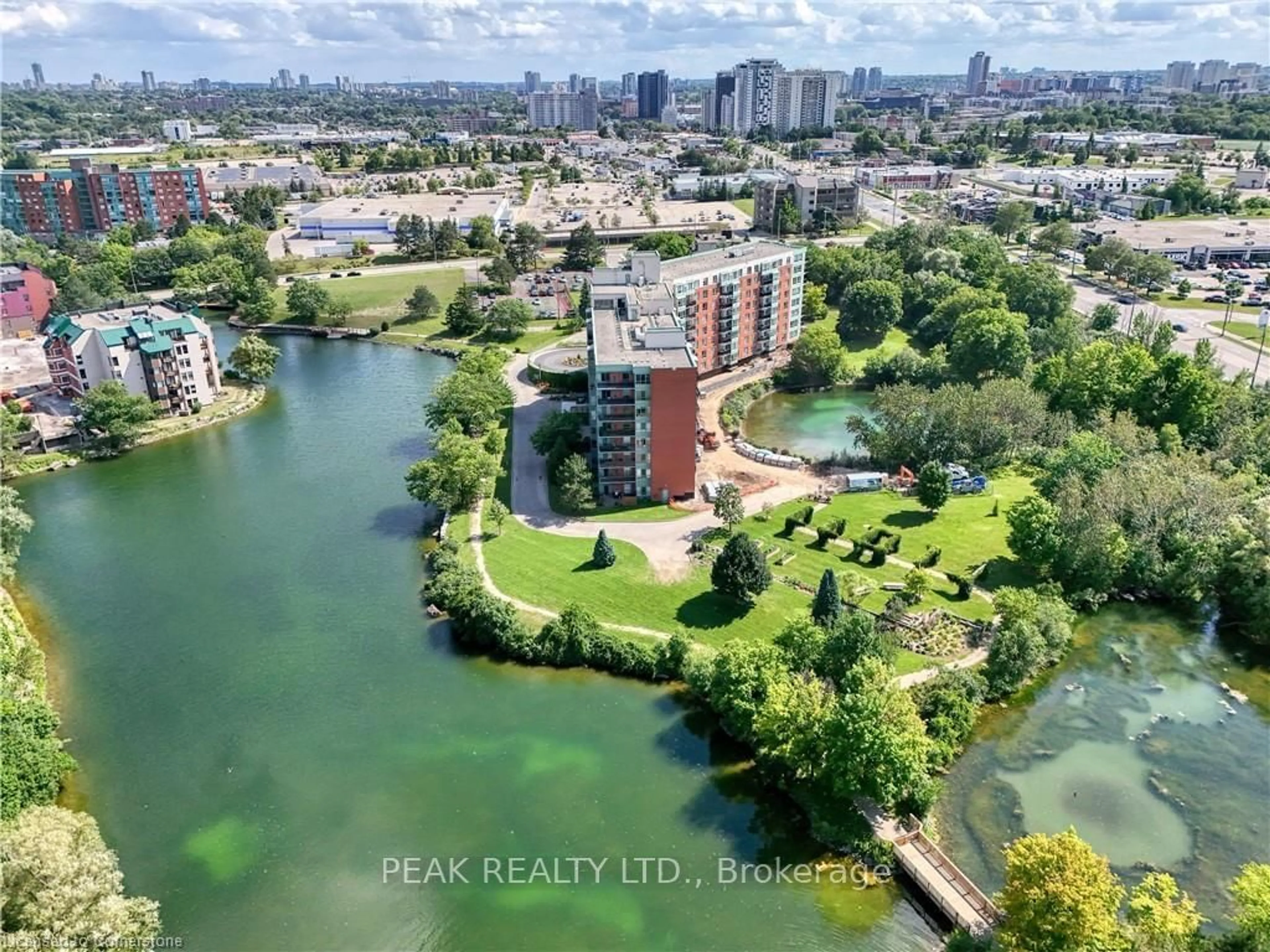 A pic from outside/outdoor area/front of a property/back of a property/a pic from drone, water/lake/river/ocean view for 30 Blue Springs Dr #416, Waterloo Ontario N2J 4T2