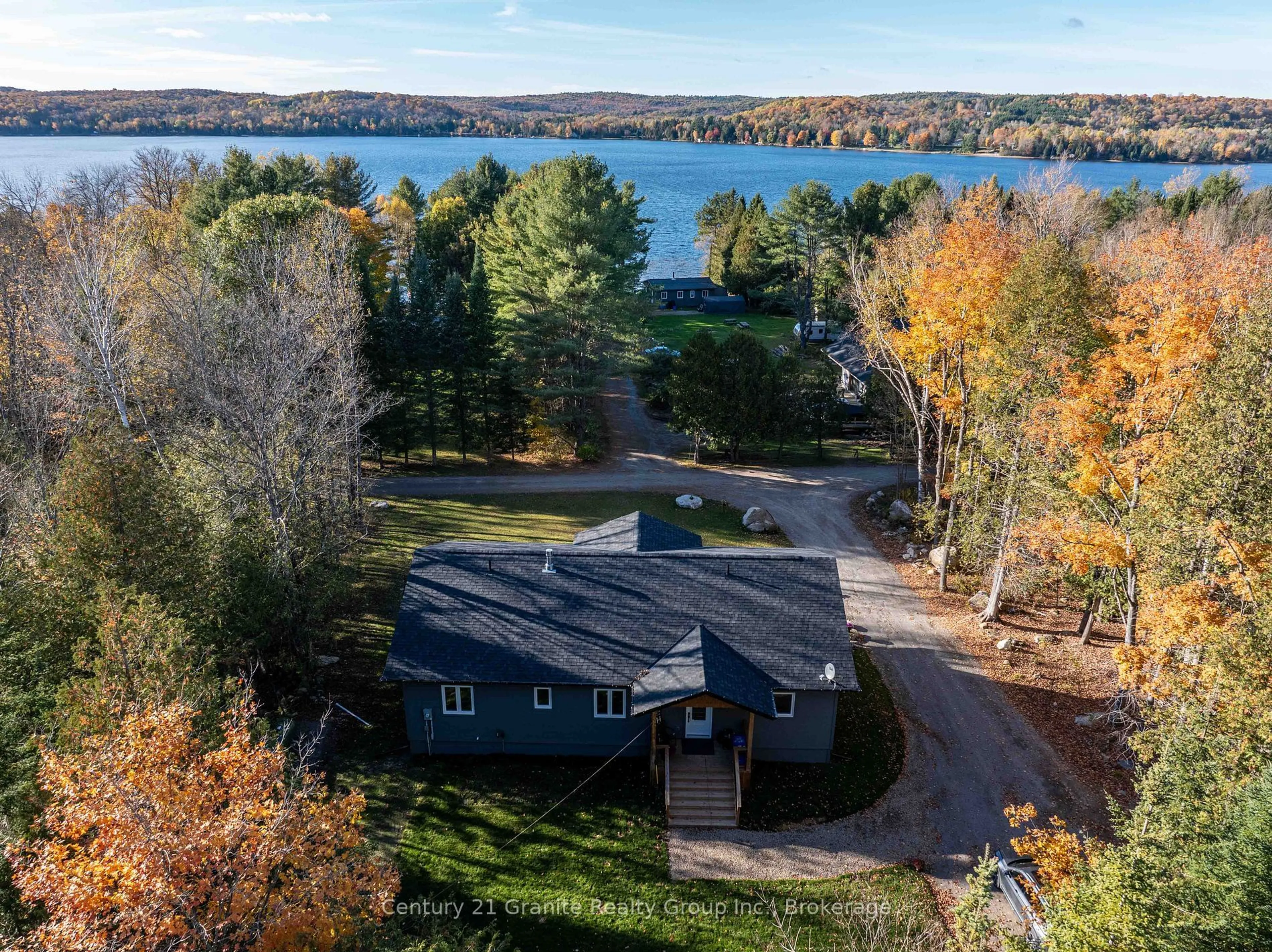 A pic from outside/outdoor area/front of a property/back of a property/a pic from drone, water/lake/river/ocean view for 1076 Providence Dr, Algonquin Highlands Ontario K0M 1S0