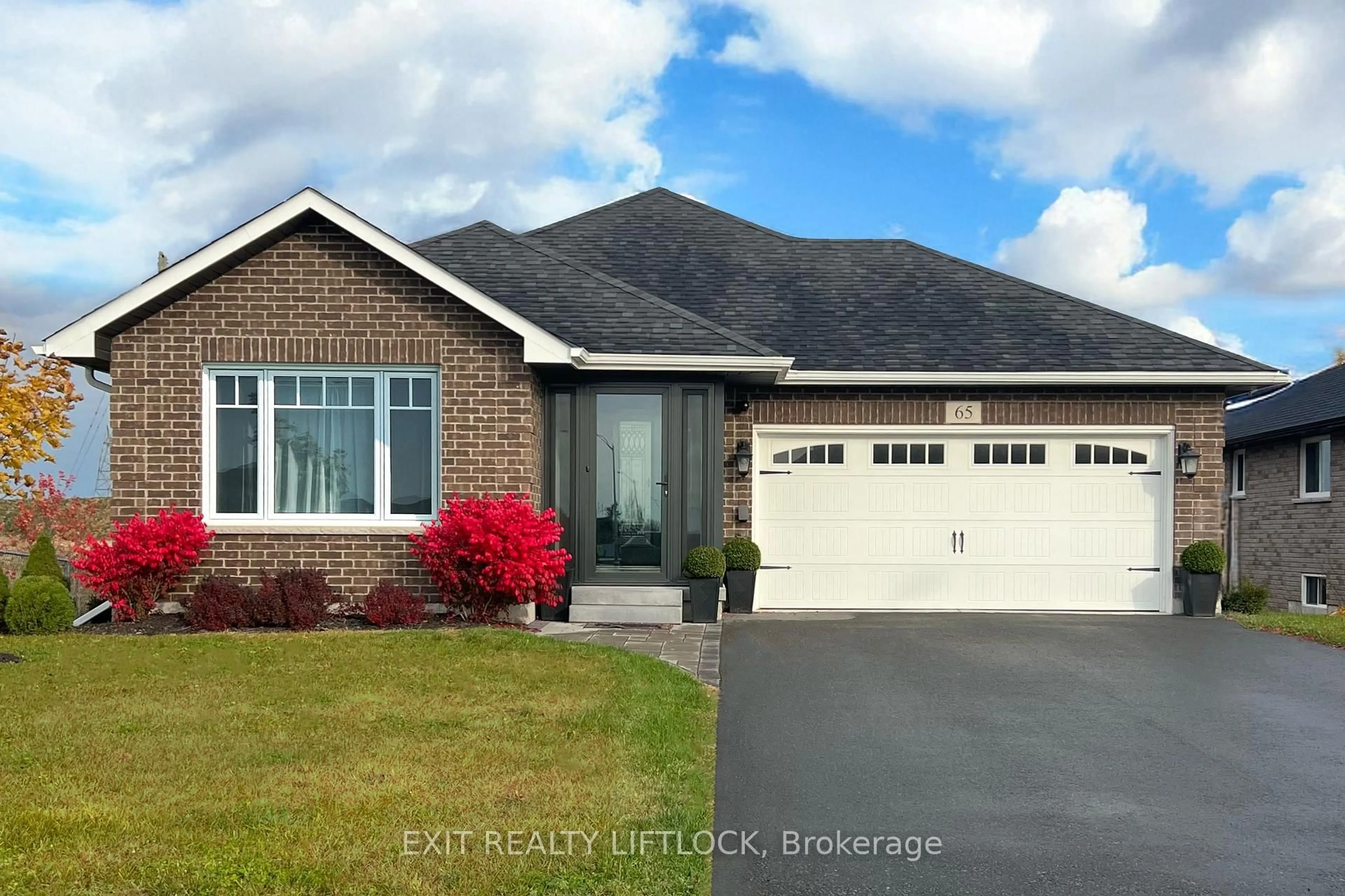 Home with brick exterior material, street for 65 Darrell Drain Cres, Asphodel-Norwood Ontario K0L 2V0