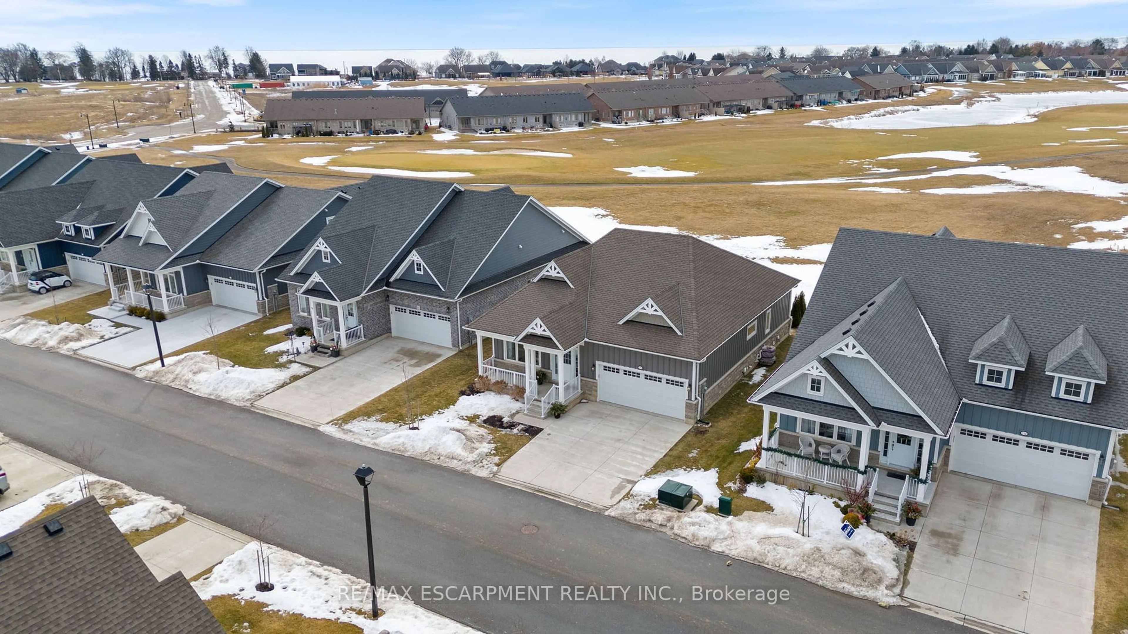 A pic from outside/outdoor area/front of a property/back of a property/a pic from drone, unknown for 238 SCHOONER Dr, Norfolk Ontario N0A 1N3