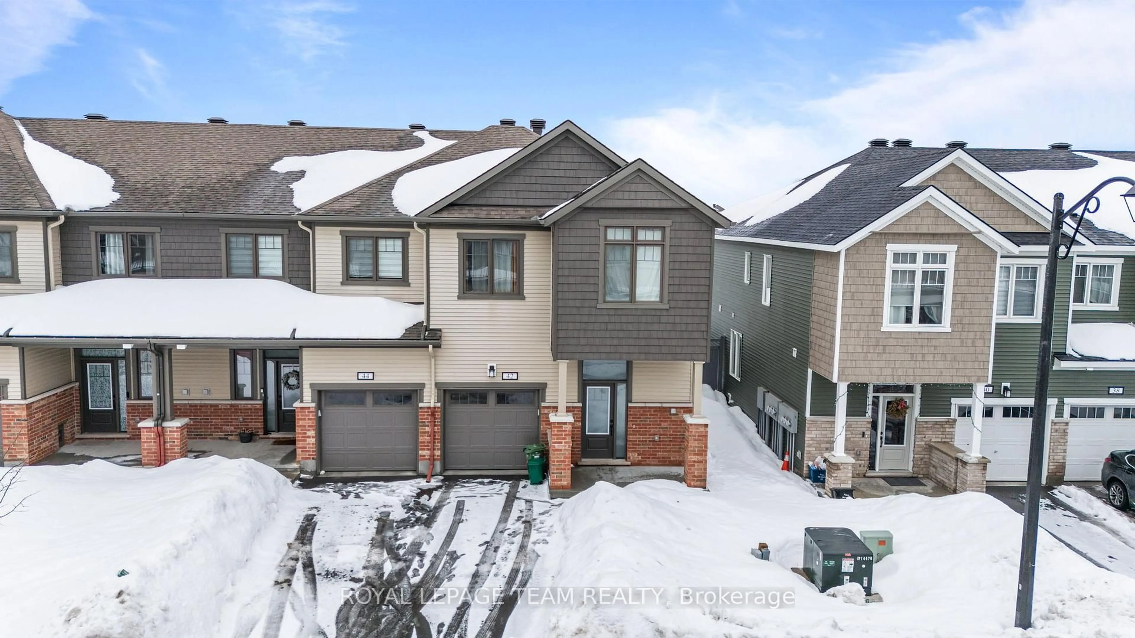 A pic from outside/outdoor area/front of a property/back of a property/a pic from drone, mountain view for 42 Lentago Ave, Barrhaven Ontario K2J 7A2