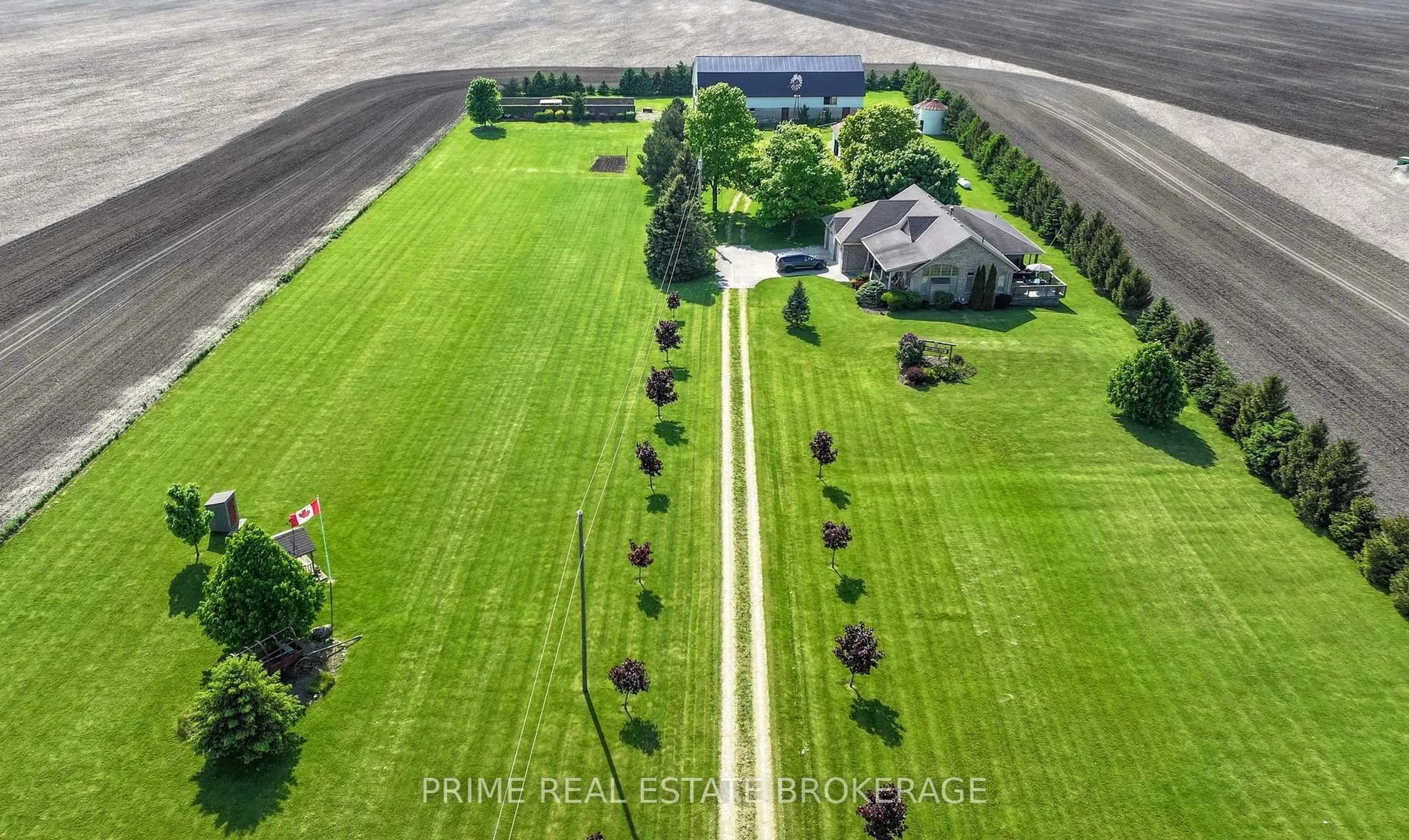 A pic from outside/outdoor area/front of a property/back of a property/a pic from drone, street for 69395 Eagleson Line, North Middlesex Ontario N0M 2K0