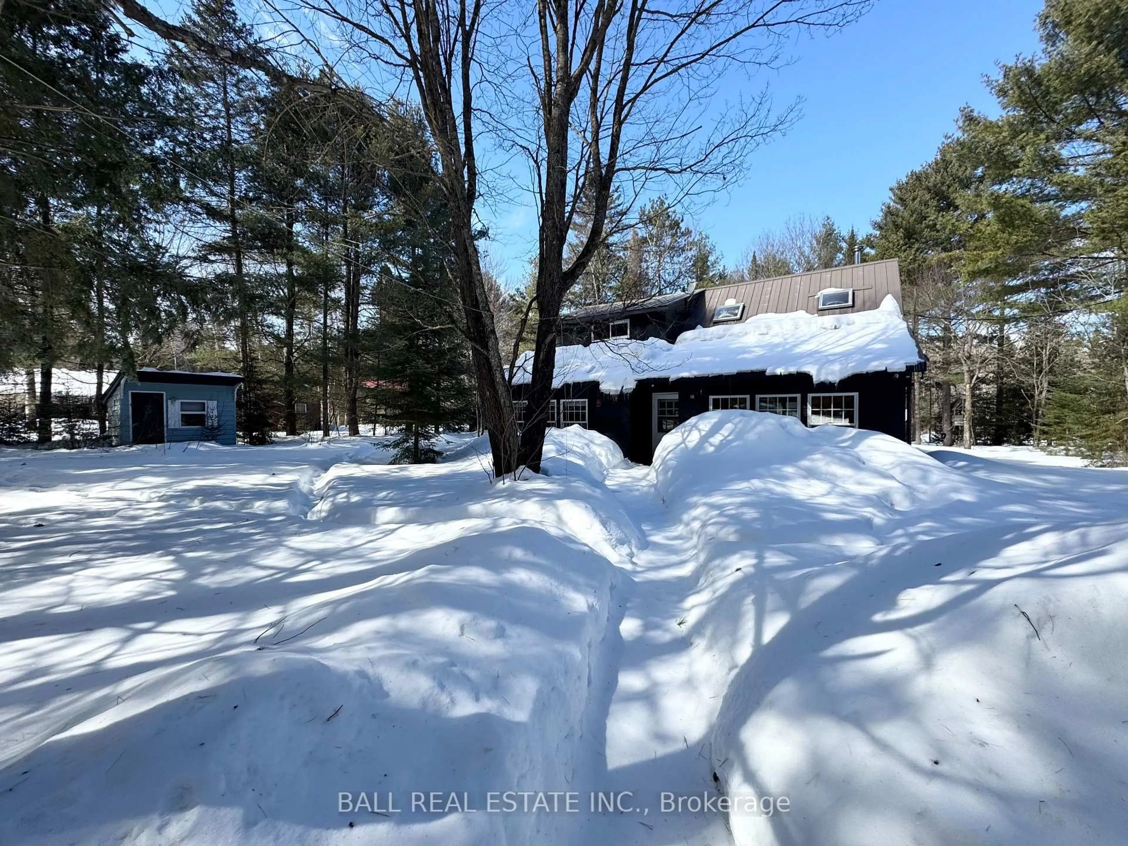 A pic from outside/outdoor area/front of a property/back of a property/a pic from drone, unknown for 11 Glory Cres, Hastings Highlands Ontario K0L 1C0