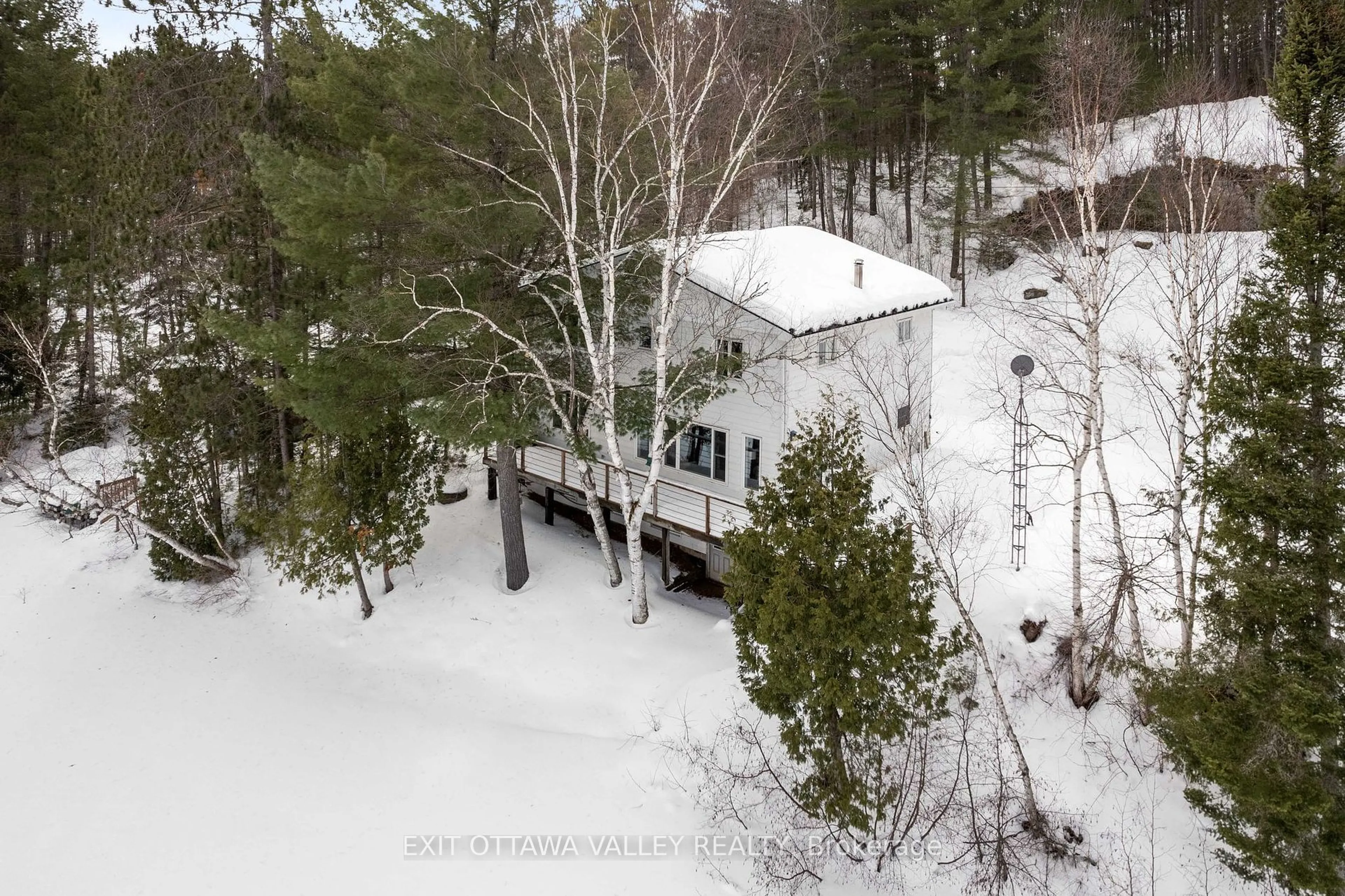 A pic from outside/outdoor area/front of a property/back of a property/a pic from drone, forest/trees view for 88 Chris Mullin Lane, Madawaska Valley Ontario K0J 1B0