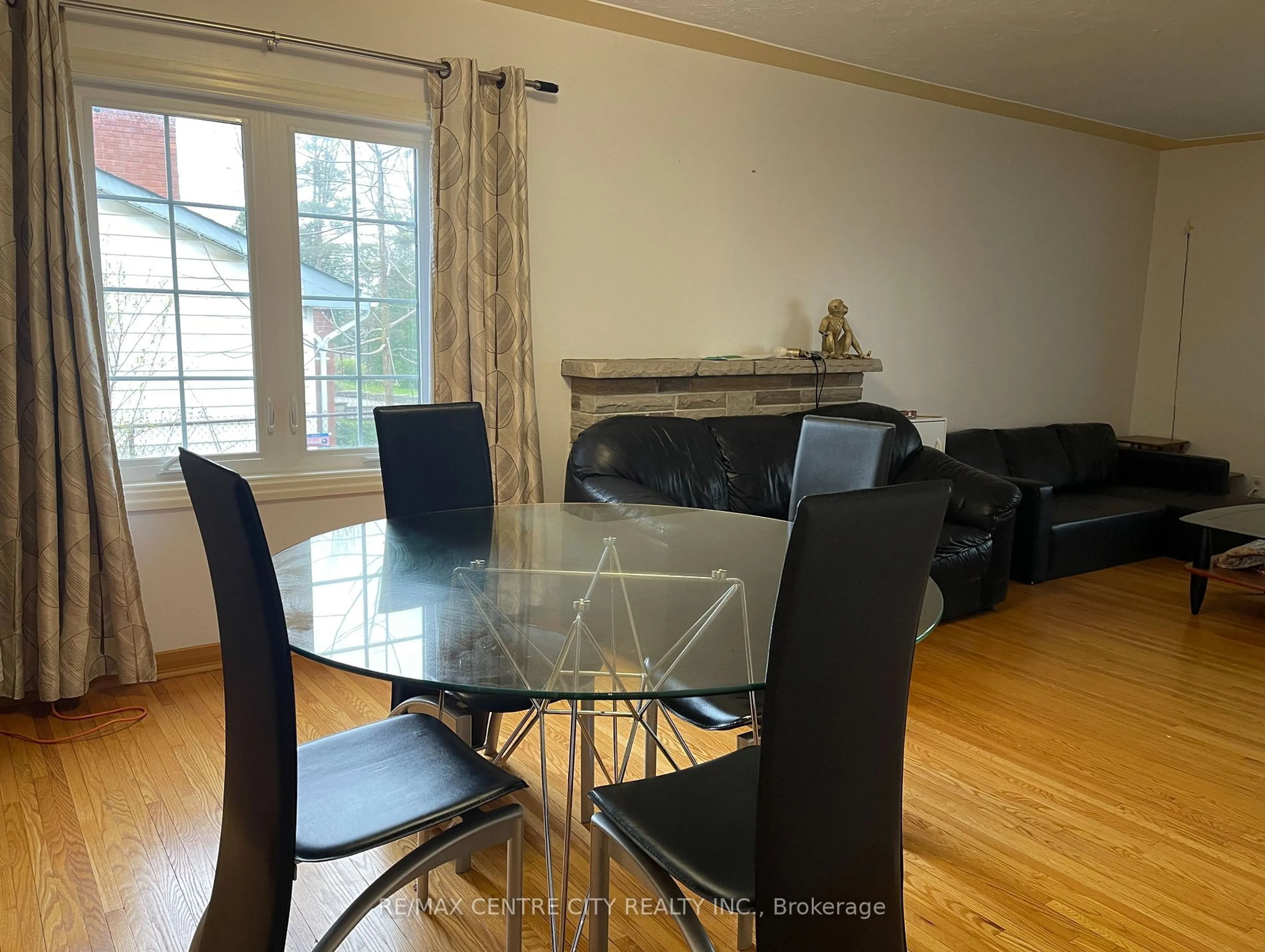 Dining room, wood/laminate floor for 345 Sarnia Rd, London North Ontario N6G 1N4