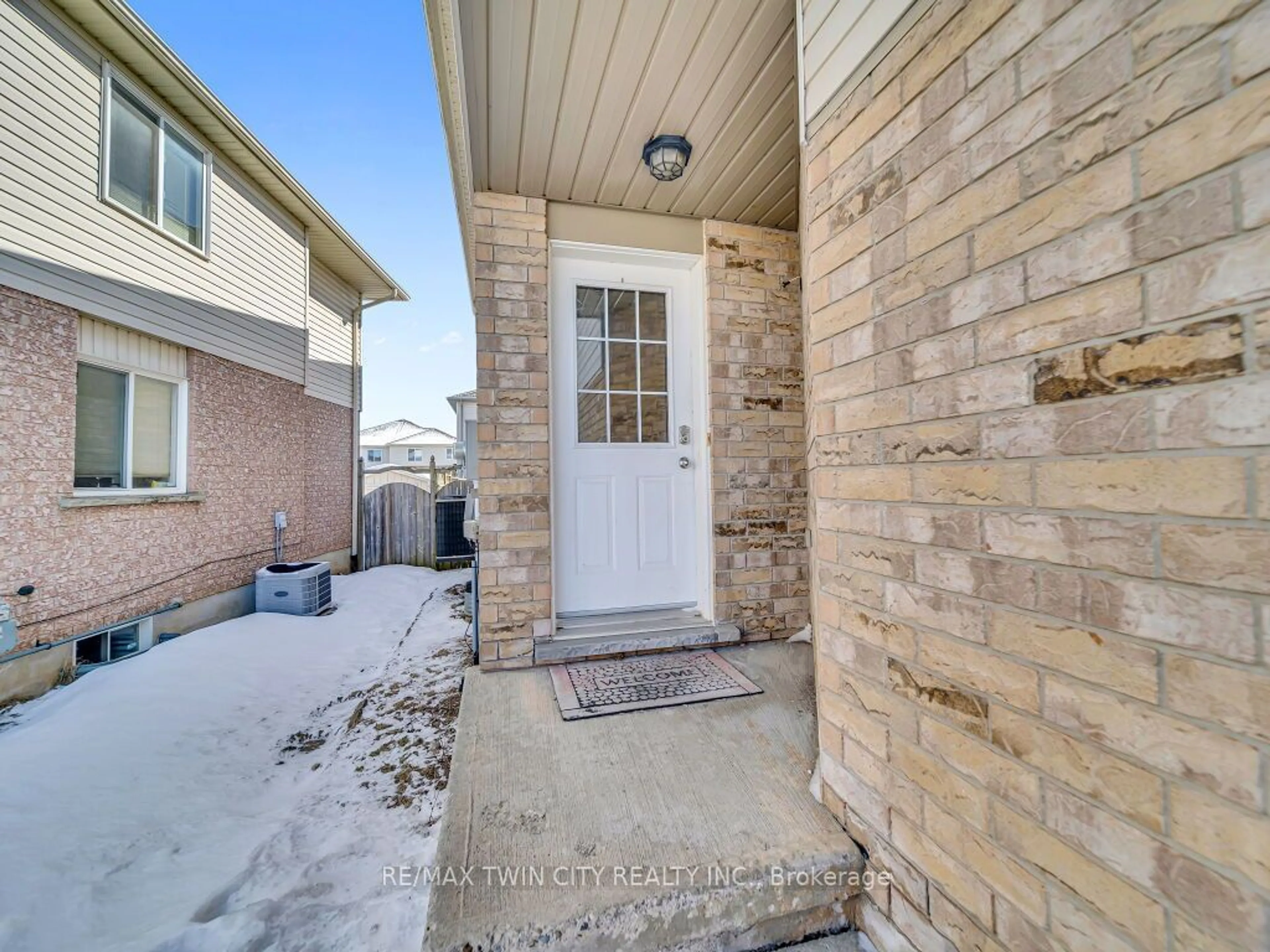 Home with brick exterior material, street for 142 Snowdrop Cres, Kitchener Ontario N2E 4G7