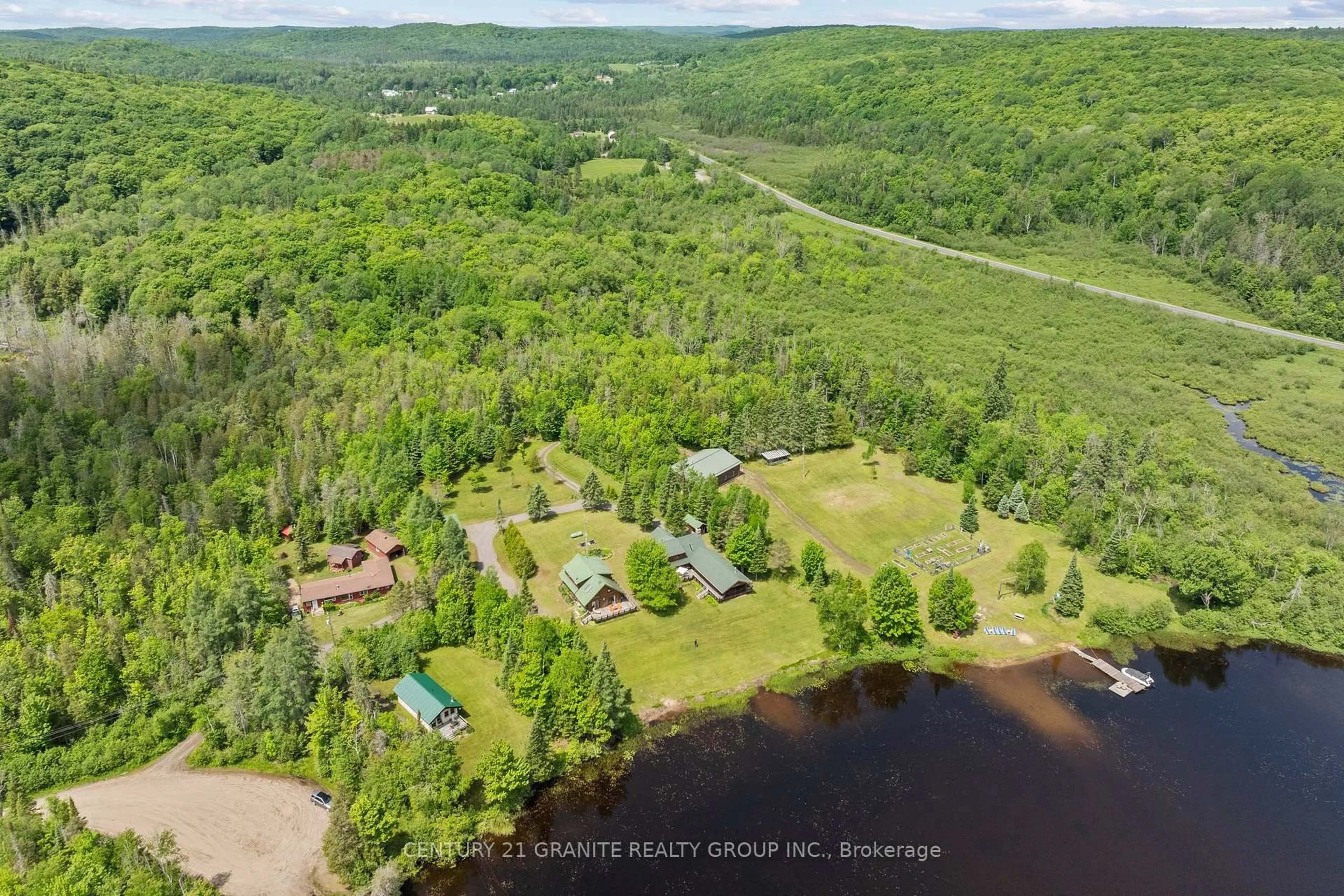 A pic from outside/outdoor area/front of a property/back of a property/a pic from drone, water/lake/river/ocean view for 1231/1233 Hagen Rd, Highlands East Ontario K0L 1M0