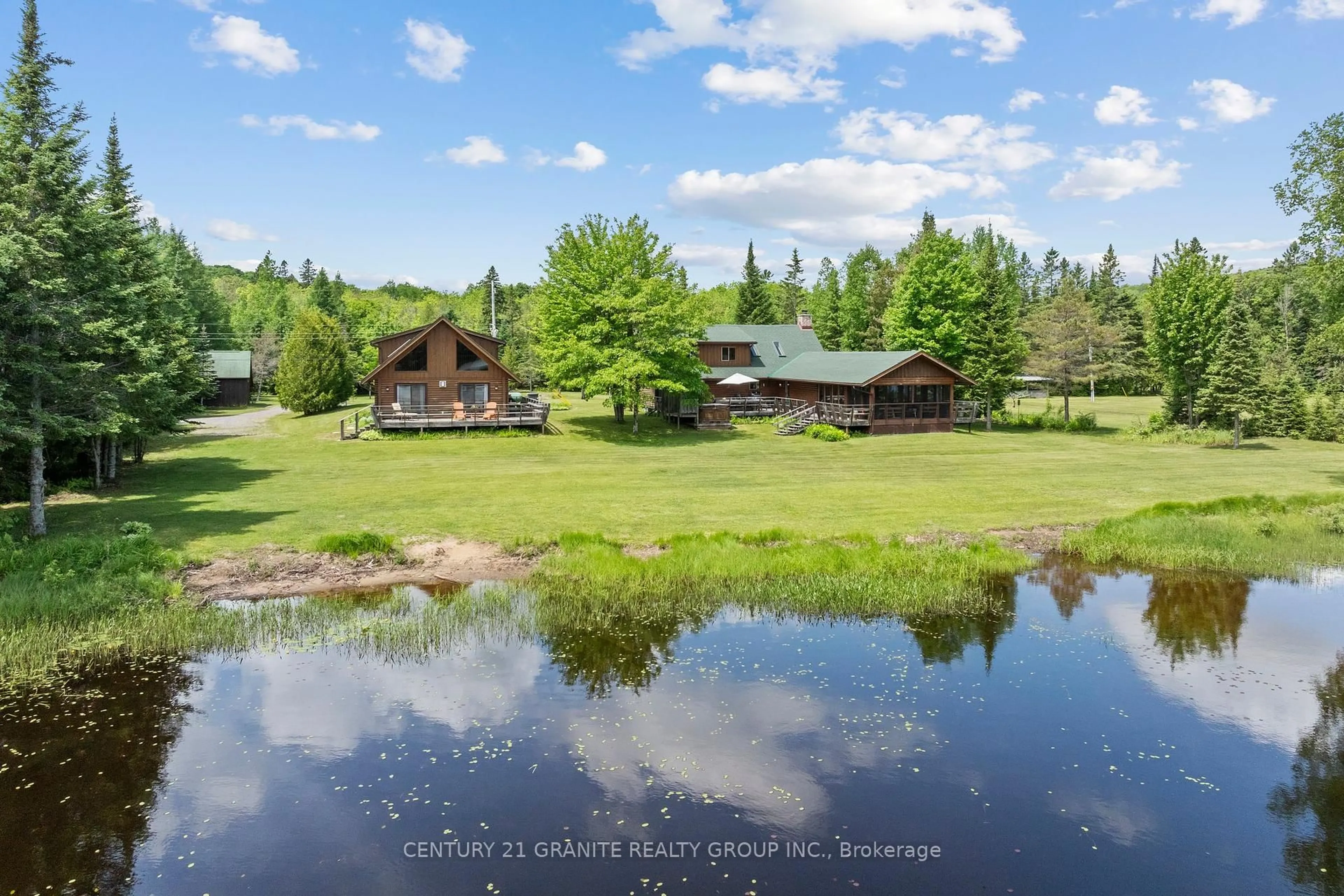 A pic from outside/outdoor area/front of a property/back of a property/a pic from drone, water/lake/river/ocean view for 1231/1233 Hagen Rd, Highlands East Ontario K0L 1M0