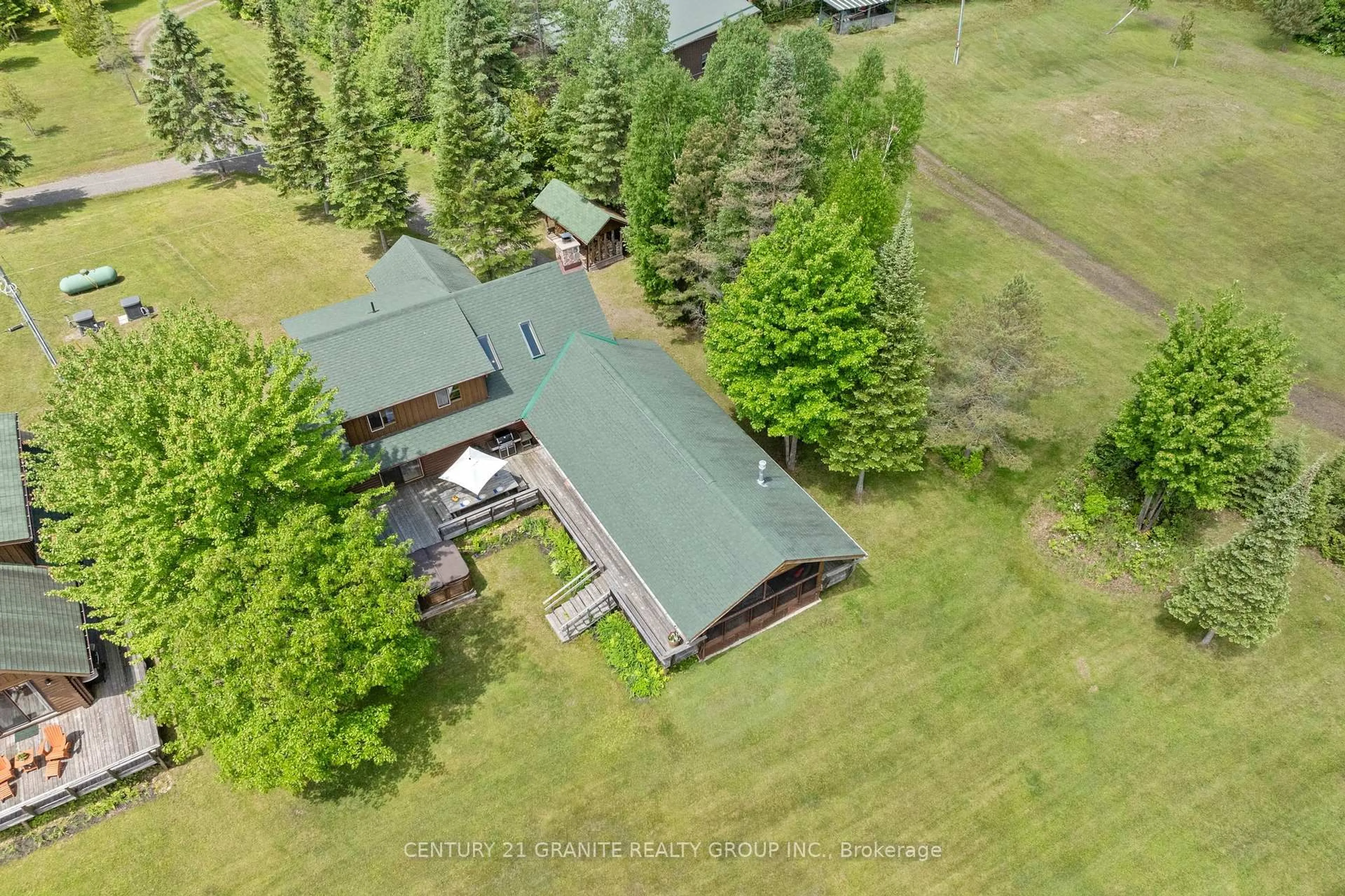 A pic from outside/outdoor area/front of a property/back of a property/a pic from drone, building for 1231/1233 Hagen Rd, Highlands East Ontario K0L 1M0