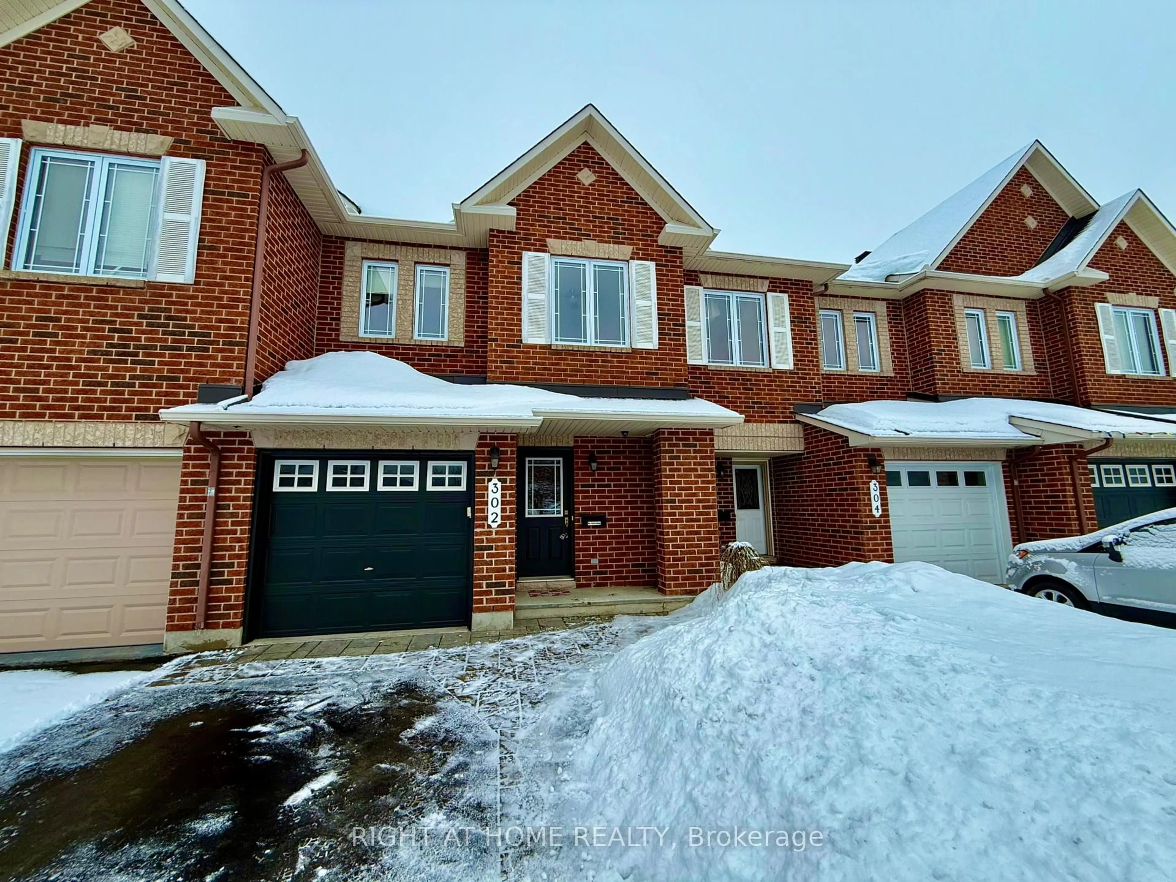 Home with brick exterior material, street for 302 Vienna Terr, Orleans - Cumberland and Area Ontario K4A 0J2