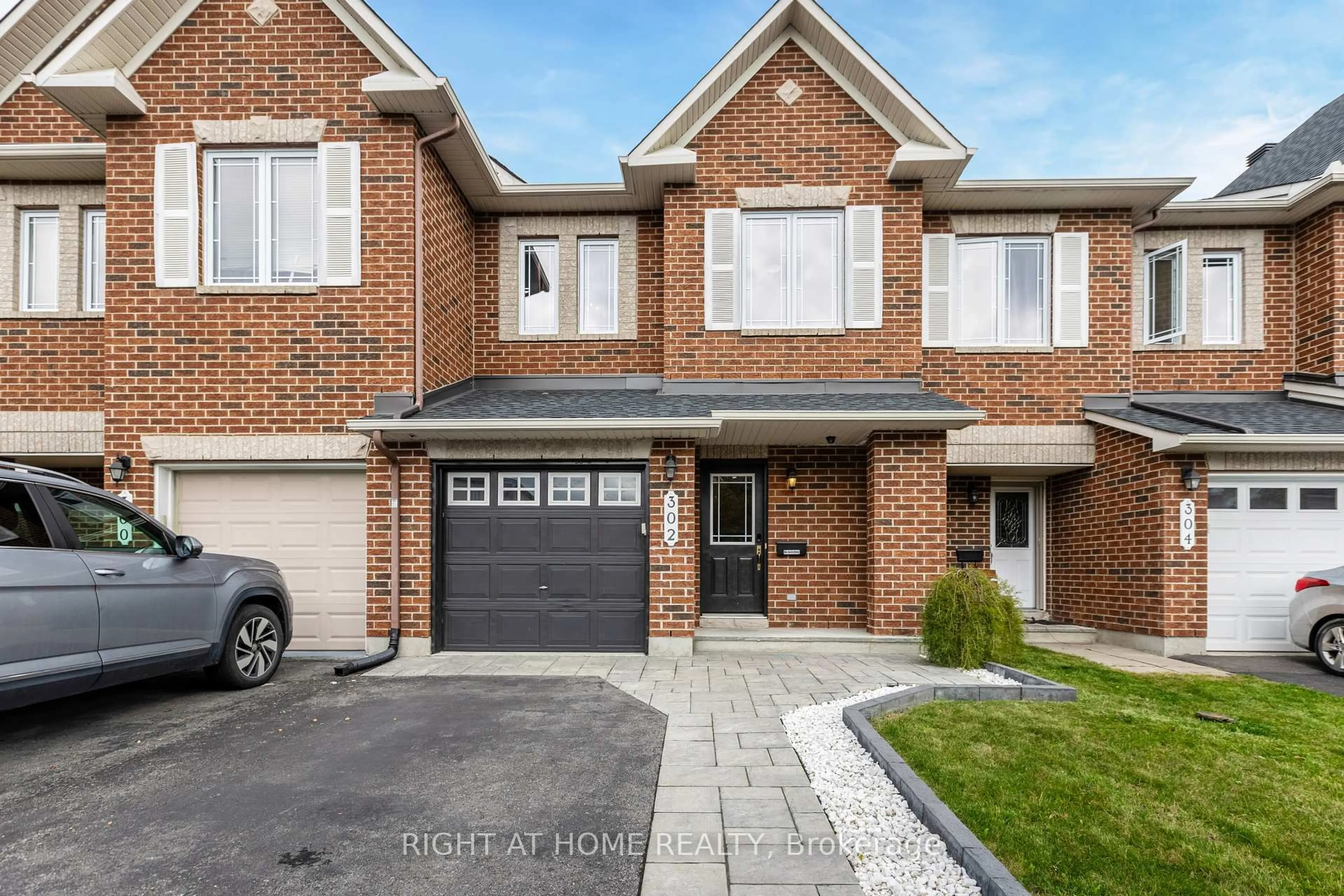 Home with brick exterior material, street for 302 Vienna Terr, Orleans - Cumberland and Area Ontario K4A 0J2