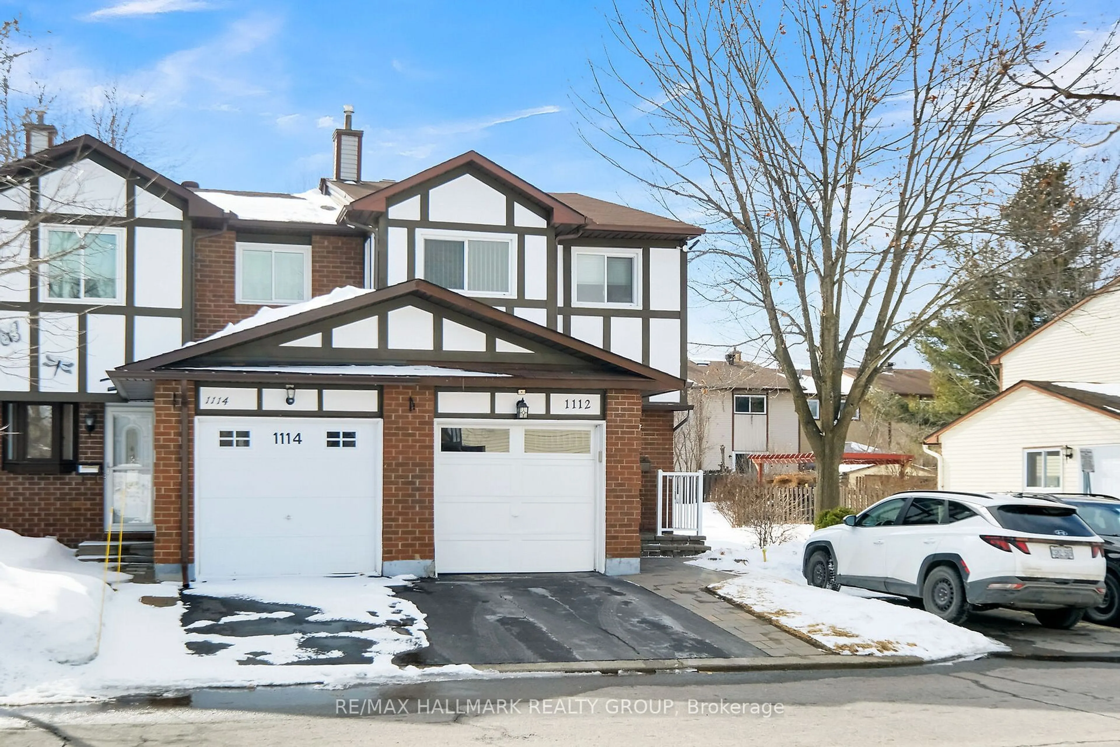 Home with brick exterior material, street for 1112 Millwood Crt, Ottawa Ontario K1C 3G1