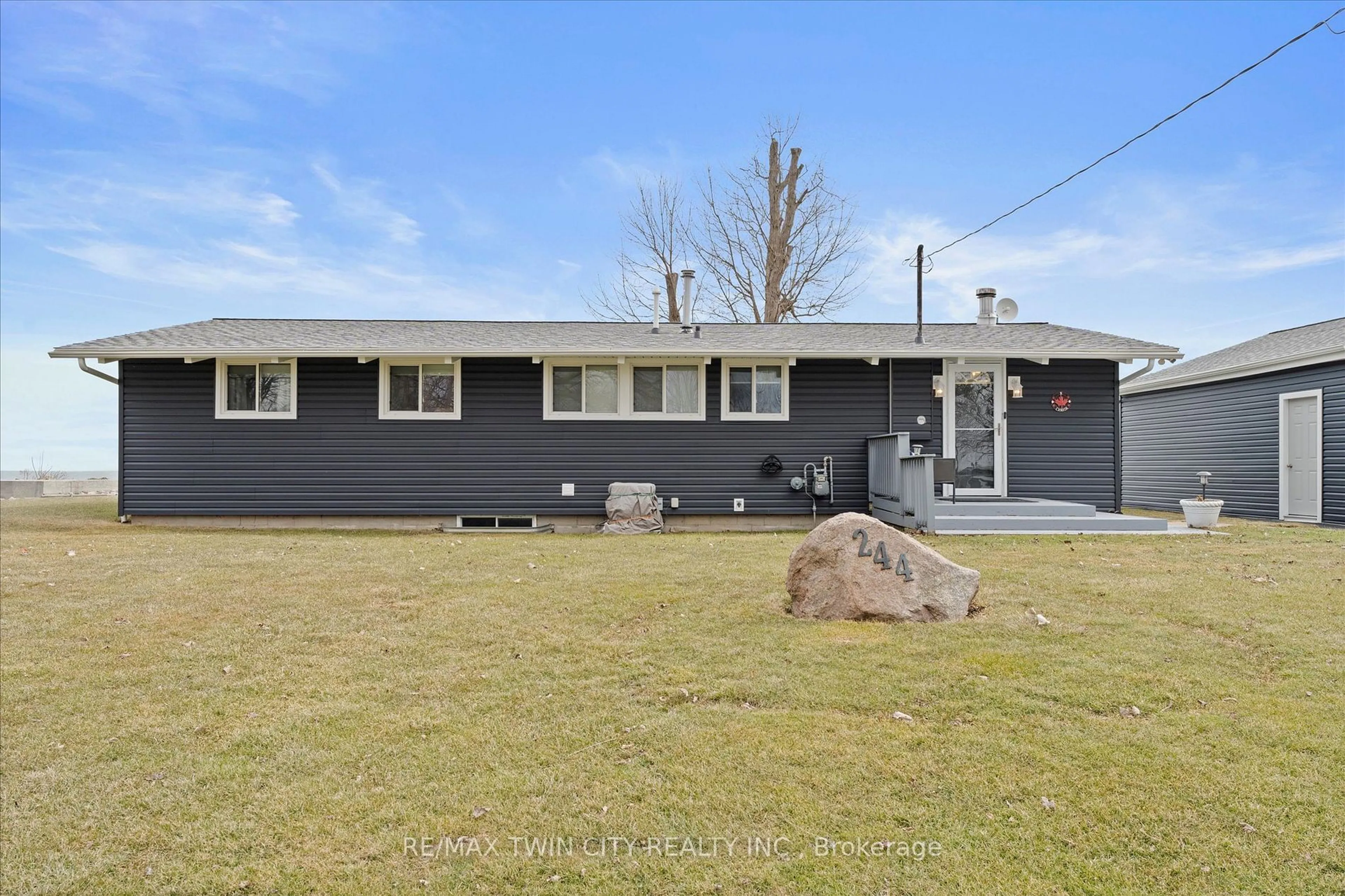 Home with vinyl exterior material, street for 244 Cotterie Park, Leamington Ontario N0P 2P0