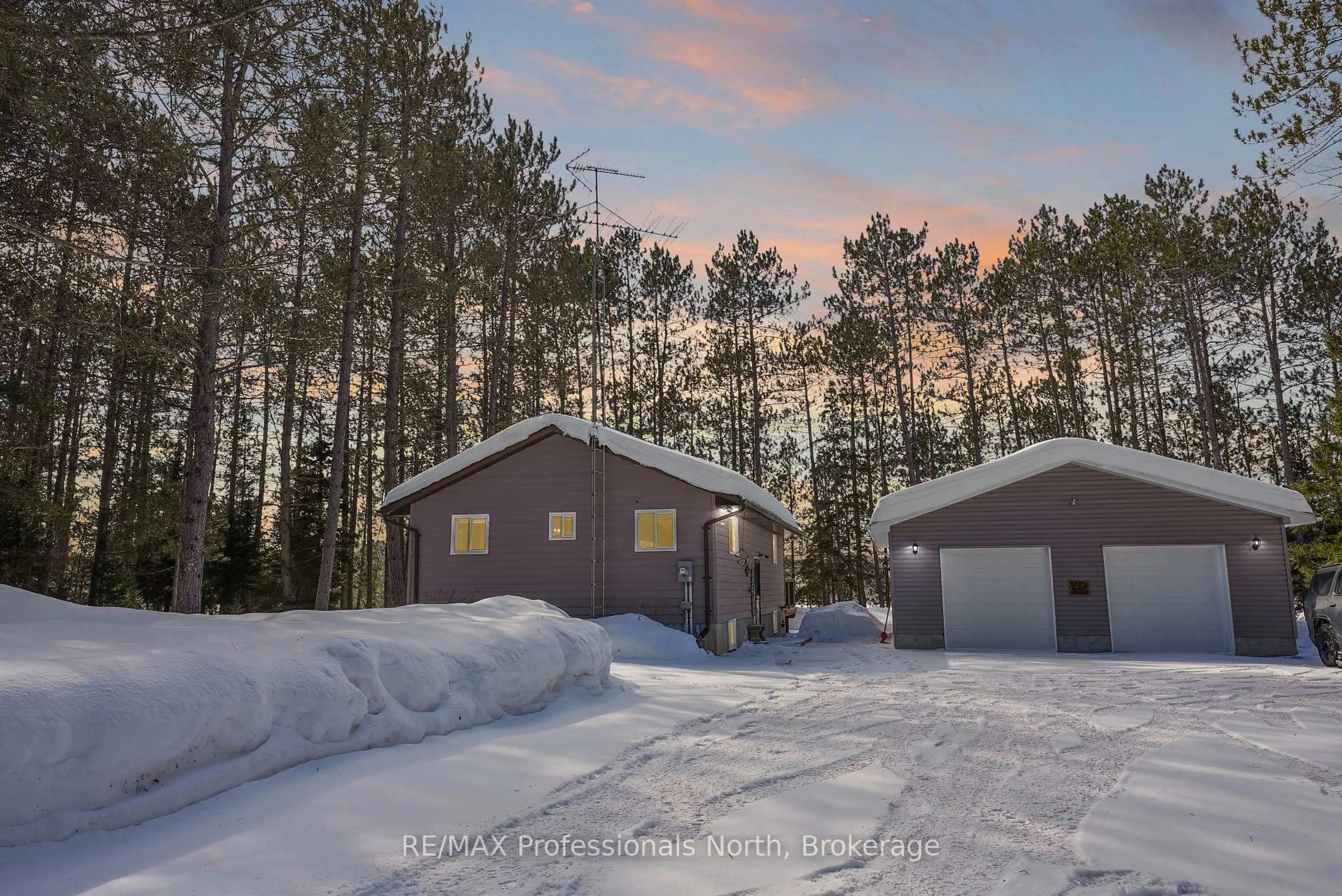 A pic from outside/outdoor area/front of a property/back of a property/a pic from drone, unknown for 1019 Sophia Rd, Highlands East Ontario K0L 2Y0