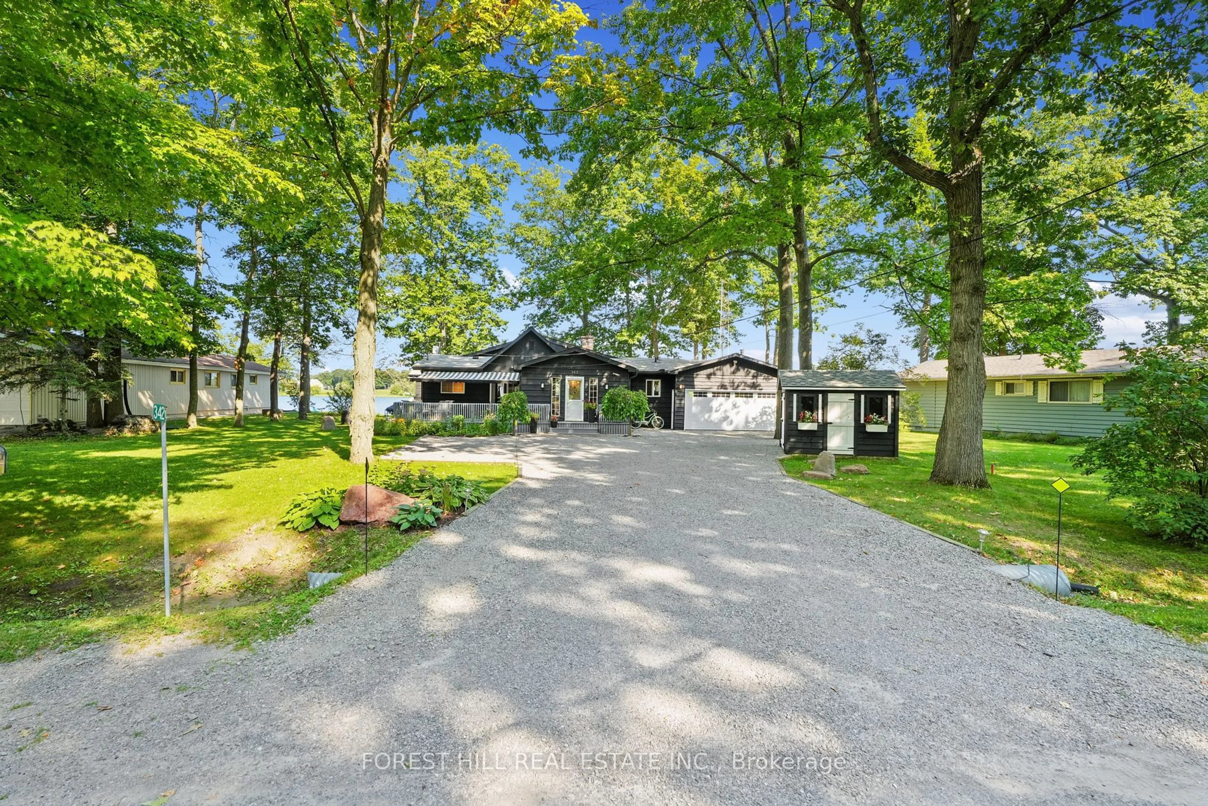 A pic from outside/outdoor area/front of a property/back of a property/a pic from drone, street for 342 Fothergill Isle, Selwyn Ontario K9J 6X2