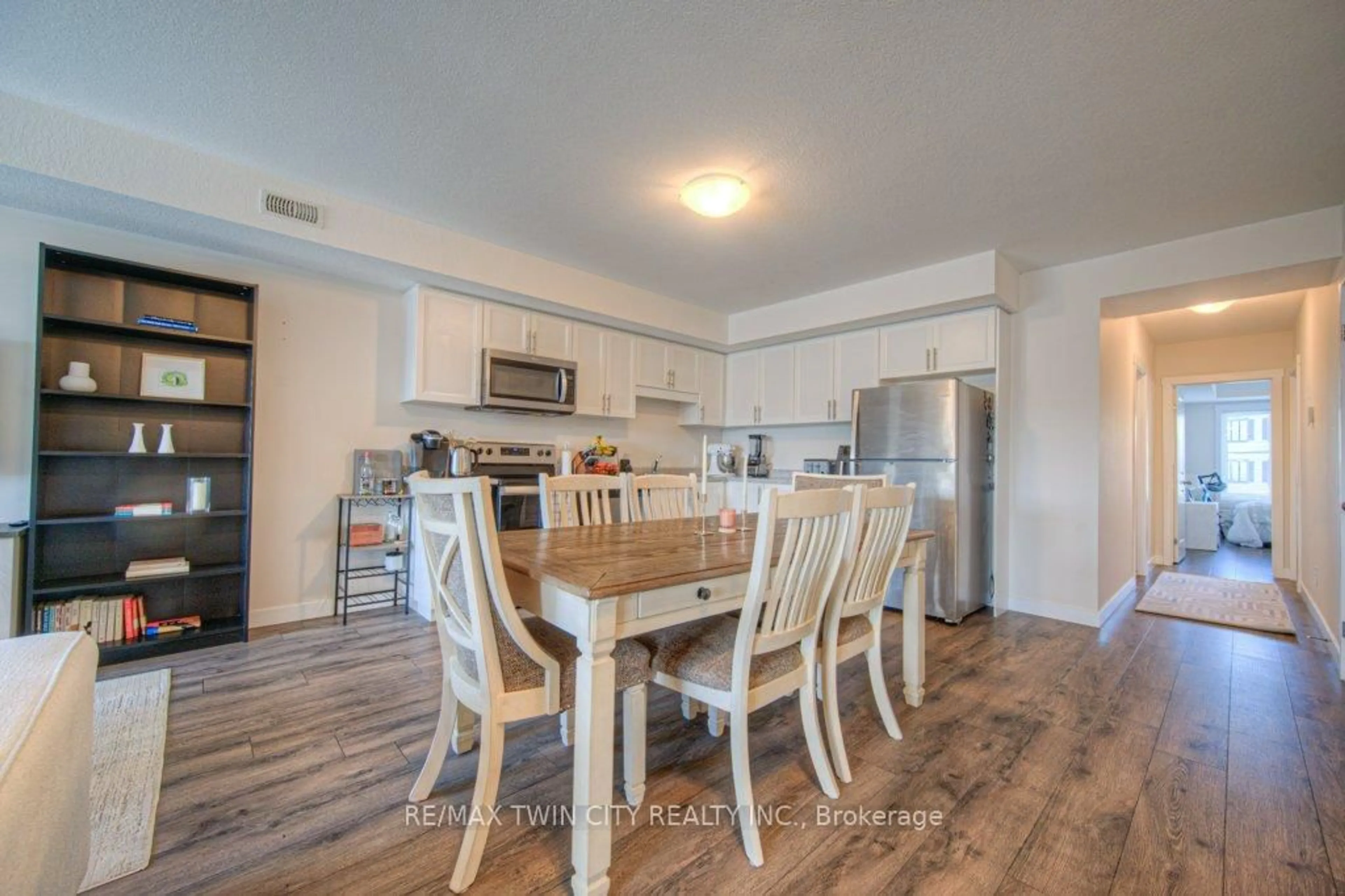 Open concept kitchen, wood/laminate floor for 164 Rochefort St #B, Kitchener Ontario N2R 0P5