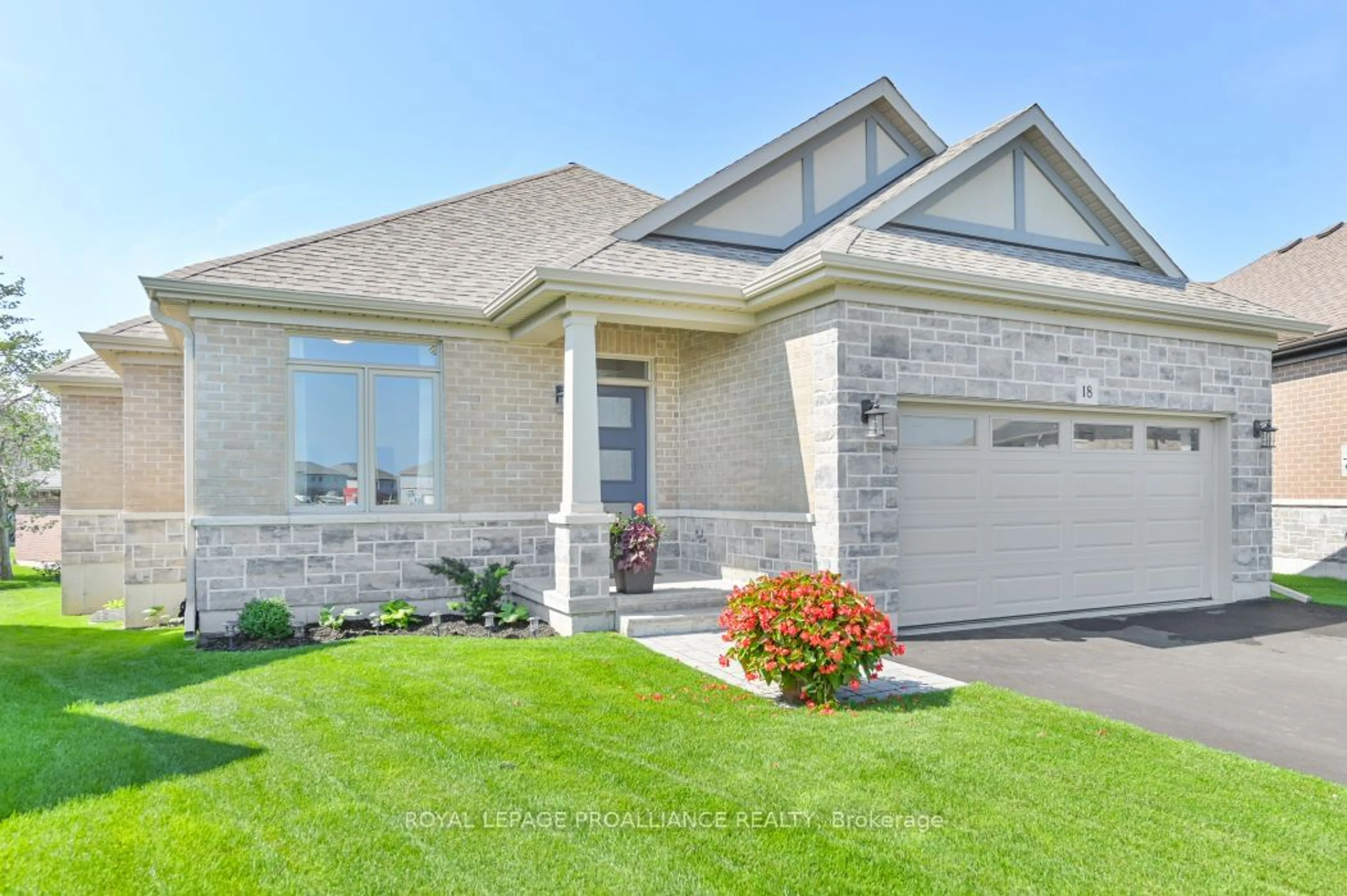 Home with brick exterior material, street for 18 Athabaska Dr, Belleville Ontario K8N 0T2