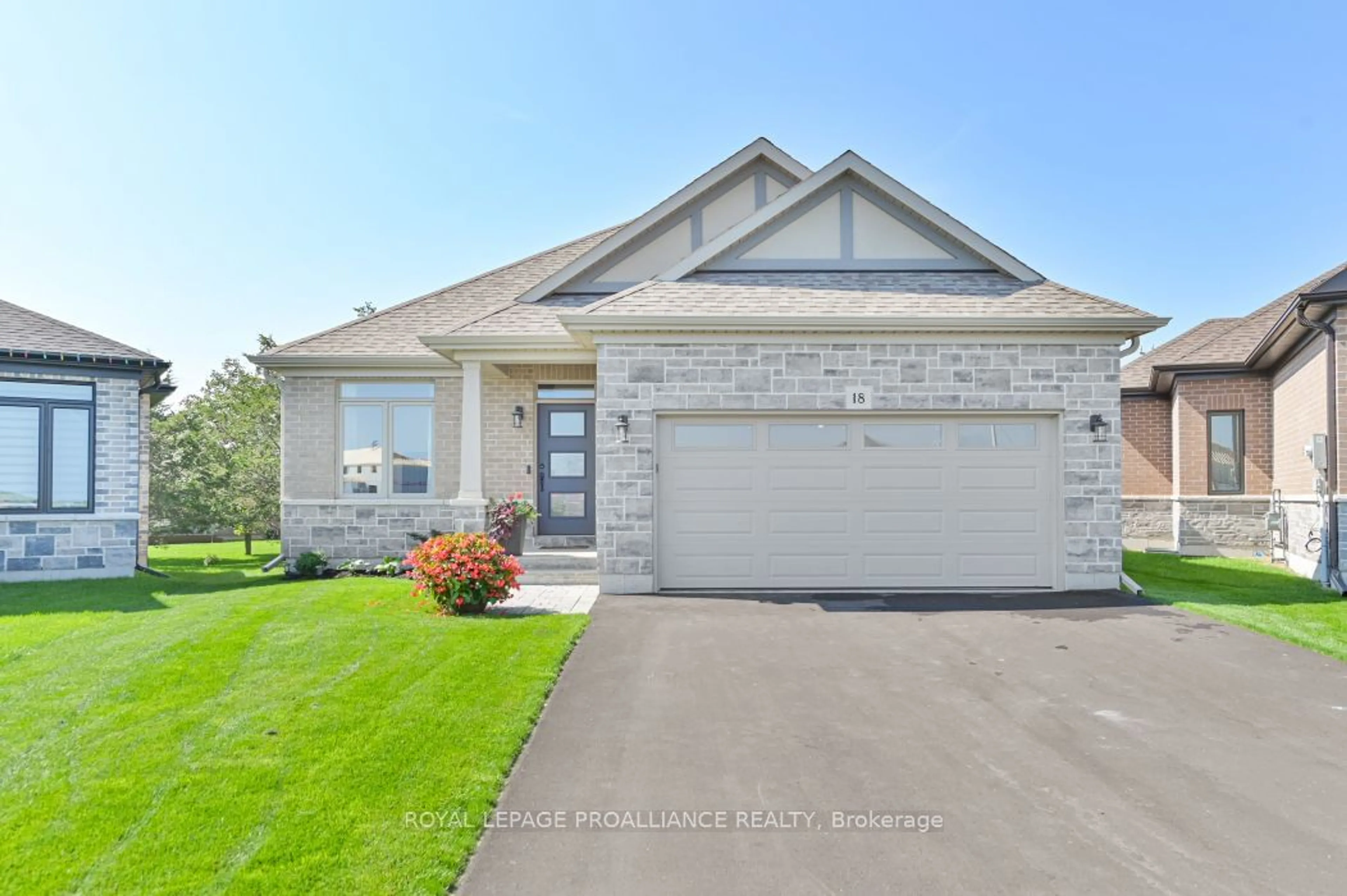 Home with brick exterior material, street for 18 Athabaska Dr, Belleville Ontario K8N 0T2