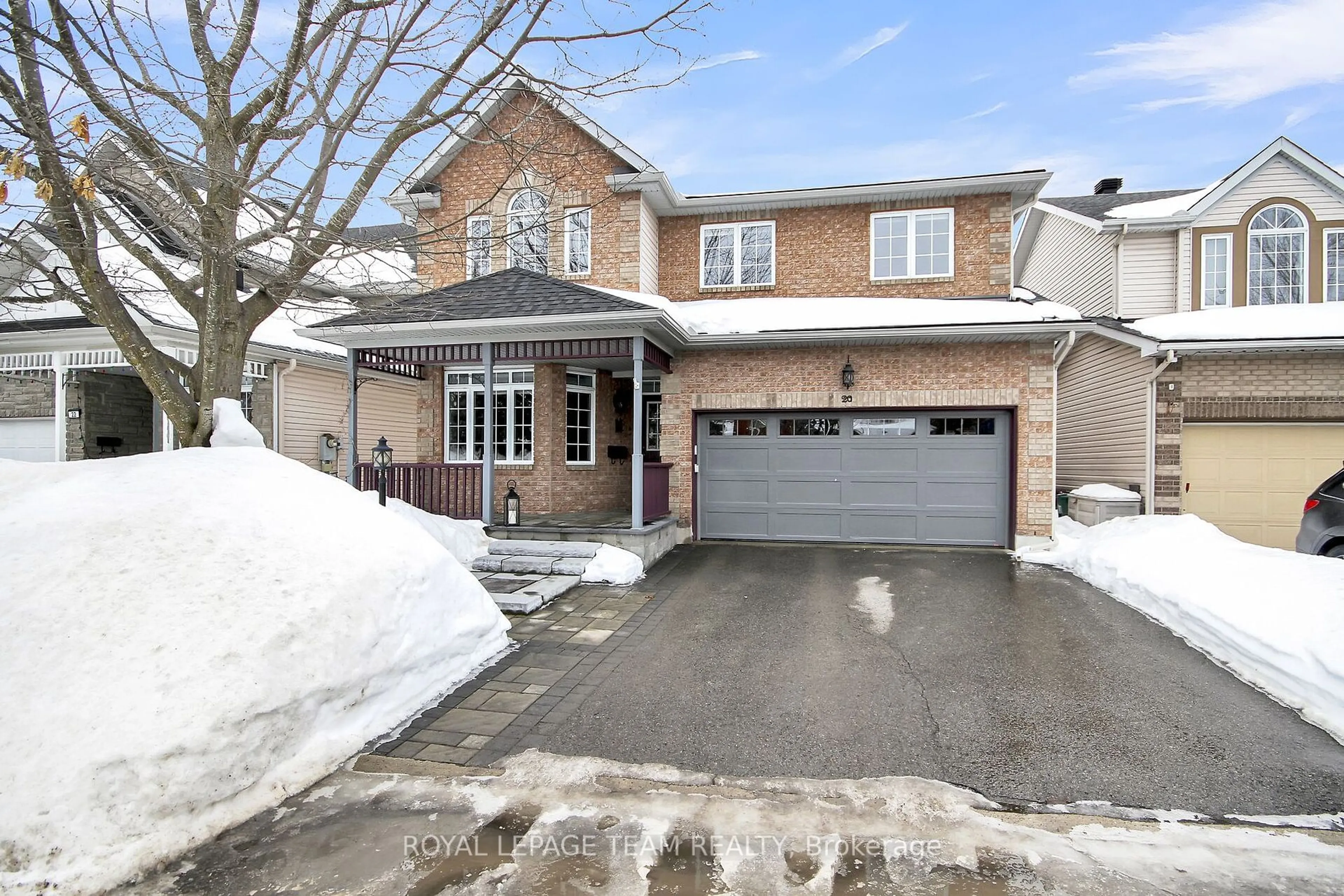 Home with brick exterior material, street for 20 Golder's Green Lane, Barrhaven Ontario K2J 5C1