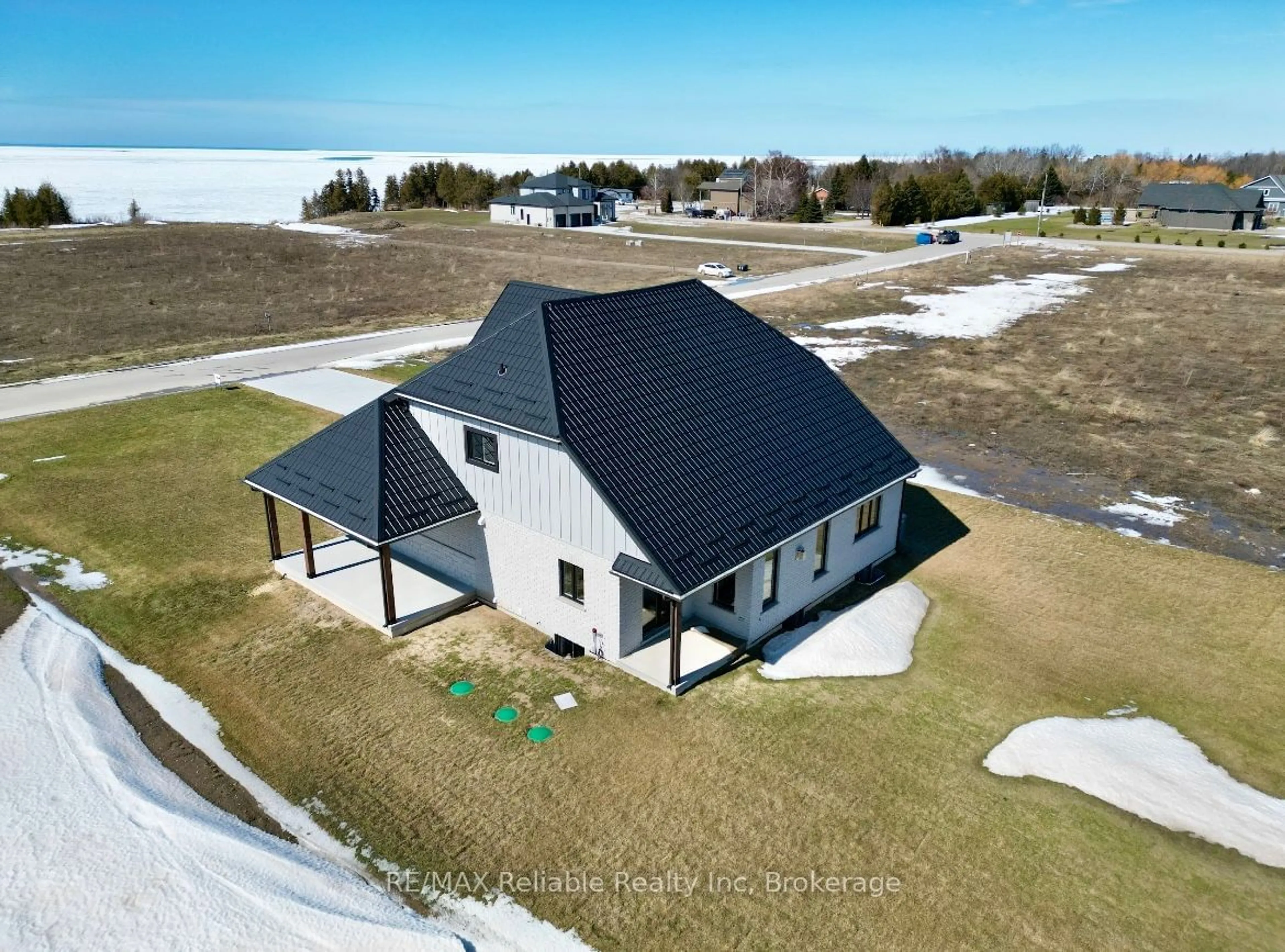 A pic from outside/outdoor area/front of a property/back of a property/a pic from drone, water/lake/river/ocean view for 73590 Irene Cres, Bluewater Ontario N0M 2T0