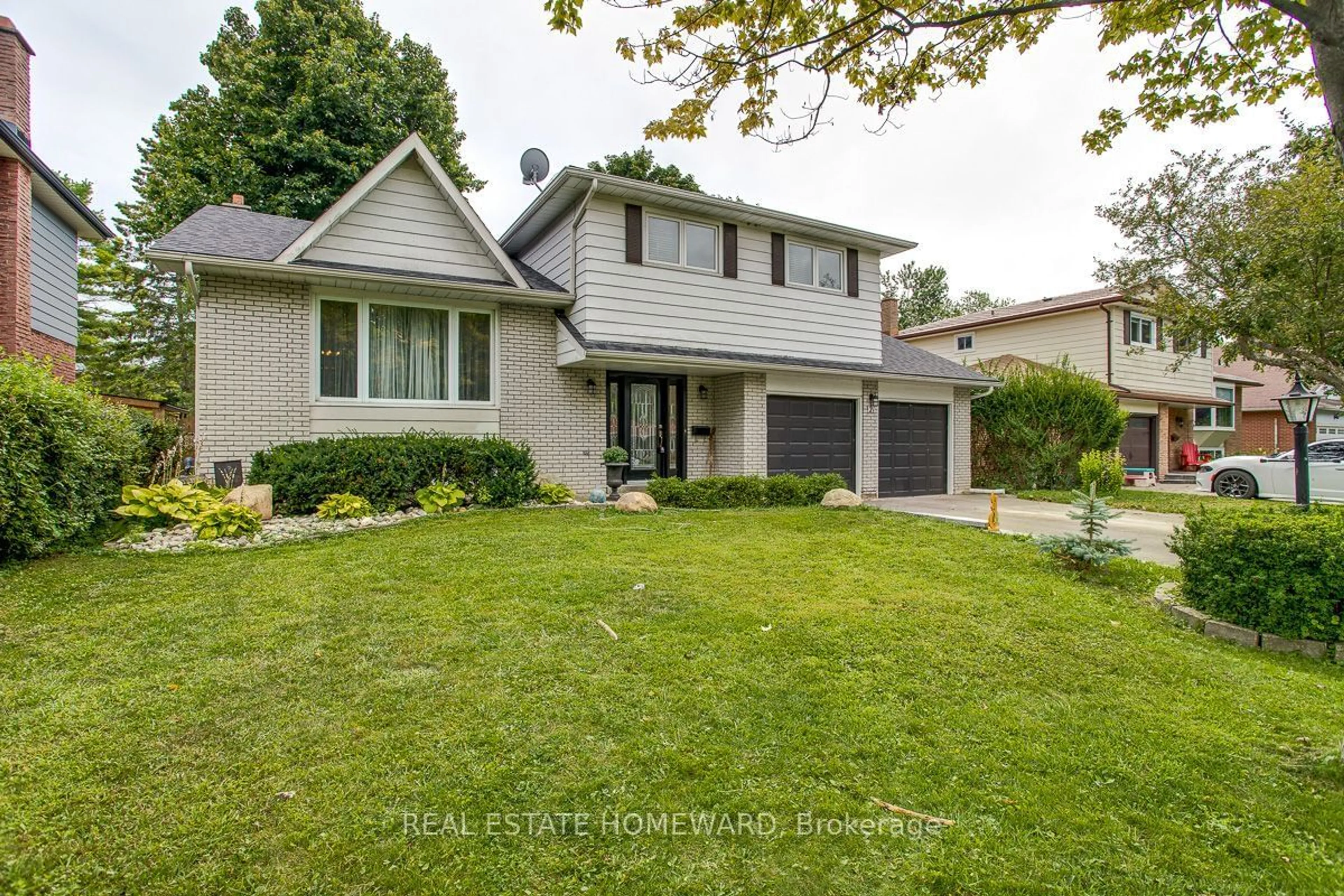 Home with vinyl exterior material, street for 21 Glen Watford Rd, Cobourg Ontario K9A 4S4