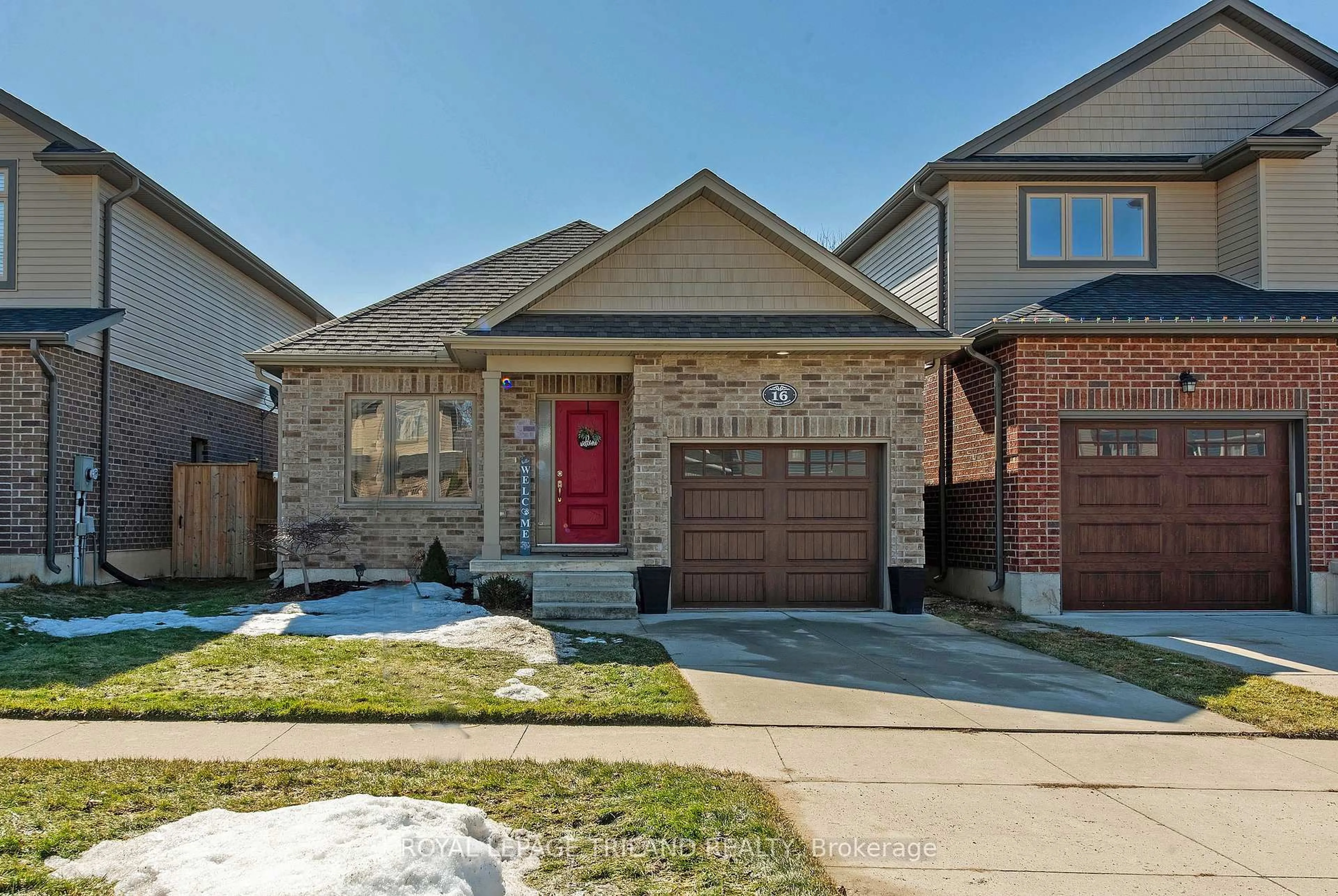Home with brick exterior material, street for 16 Queensway Dr, Strathroy-Caradoc Ontario N7G 4M3