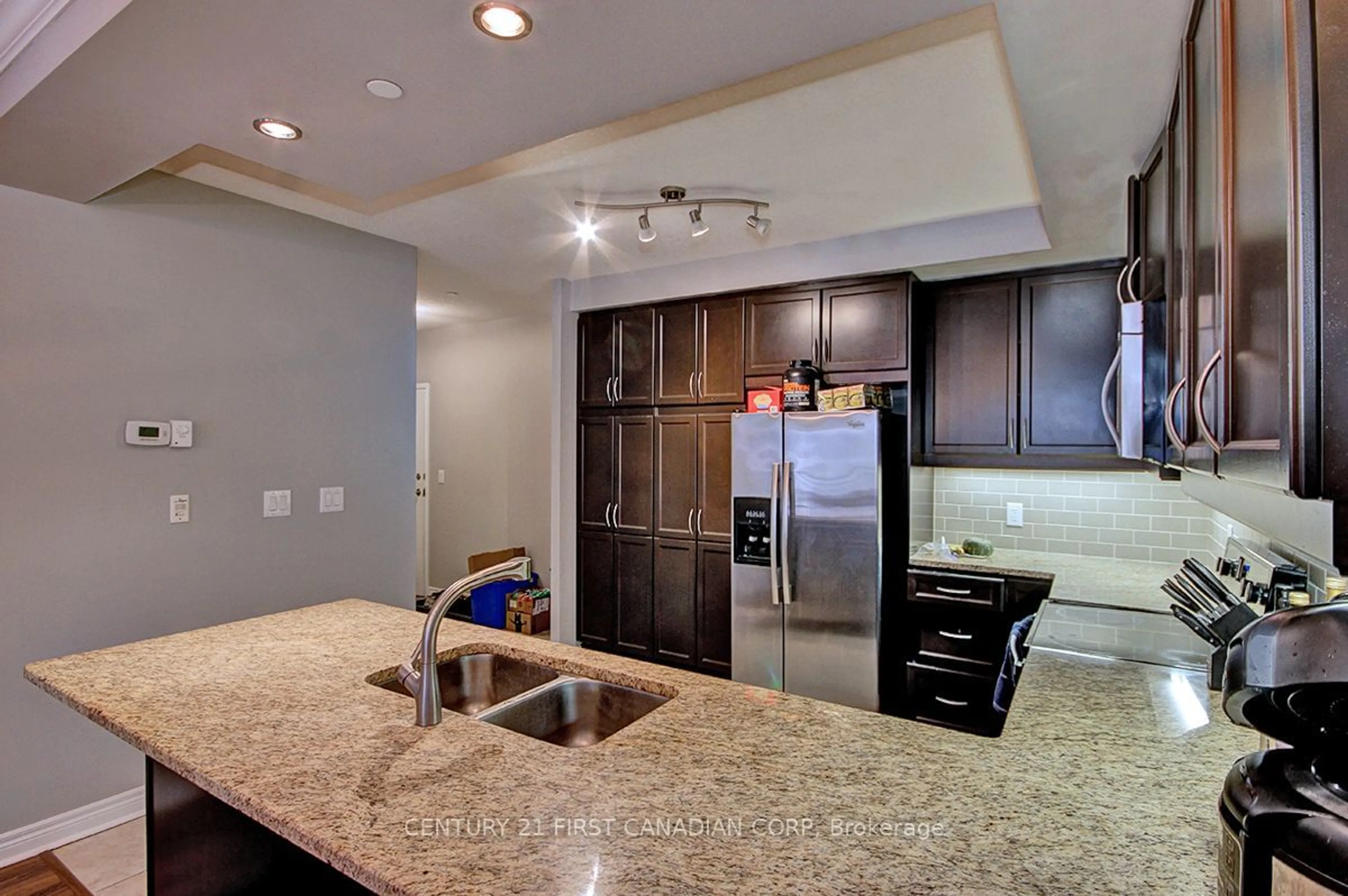 Open concept kitchen, ceramic/tile floor for 330 Ridout St #1502, London Ontario N6A 0A7