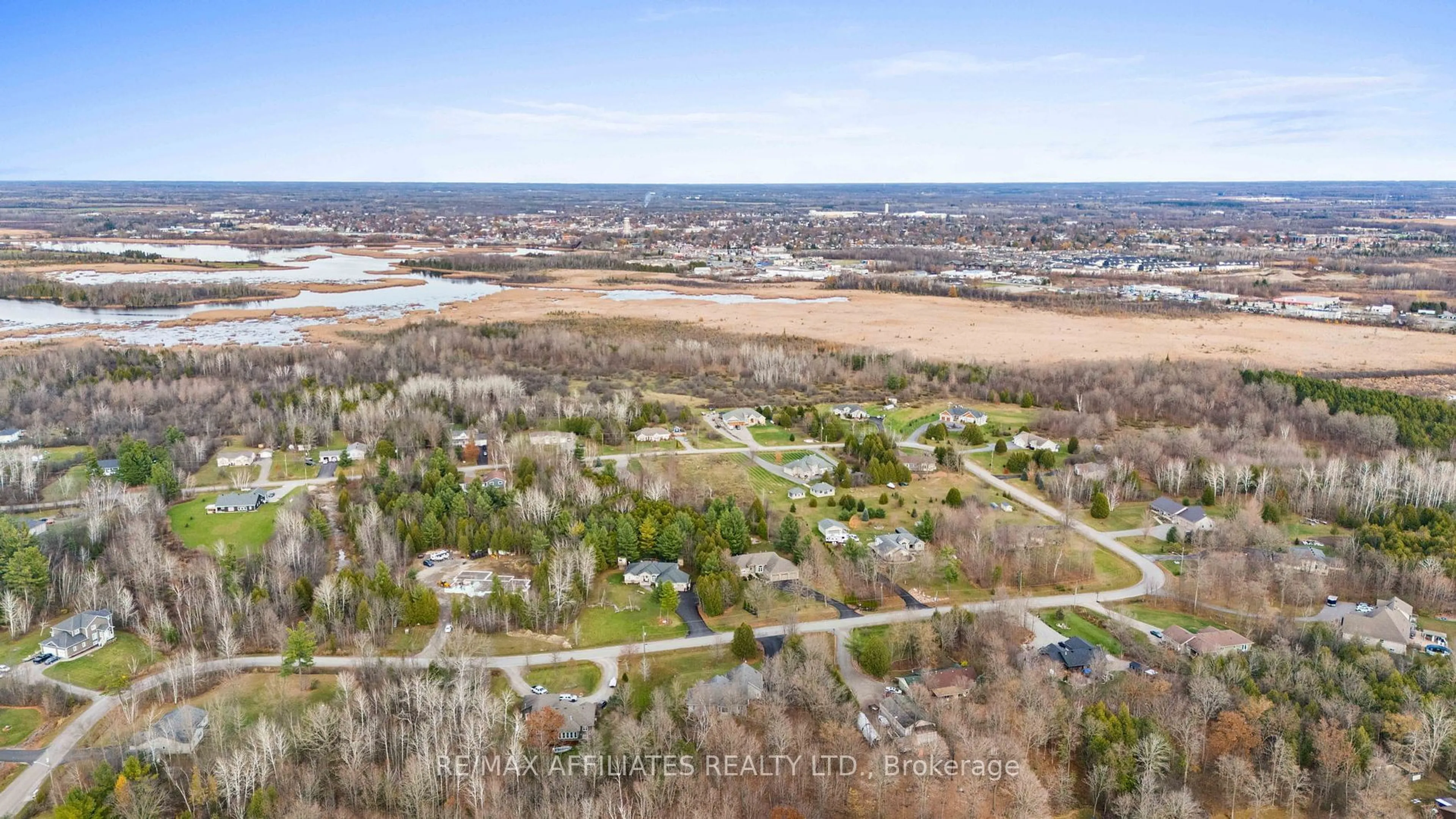 A pic from outside/outdoor area/front of a property/back of a property/a pic from drone, water/lake/river/ocean view for 11 Basswood Cres, Rideau Lakes Ontario K7A 5B8