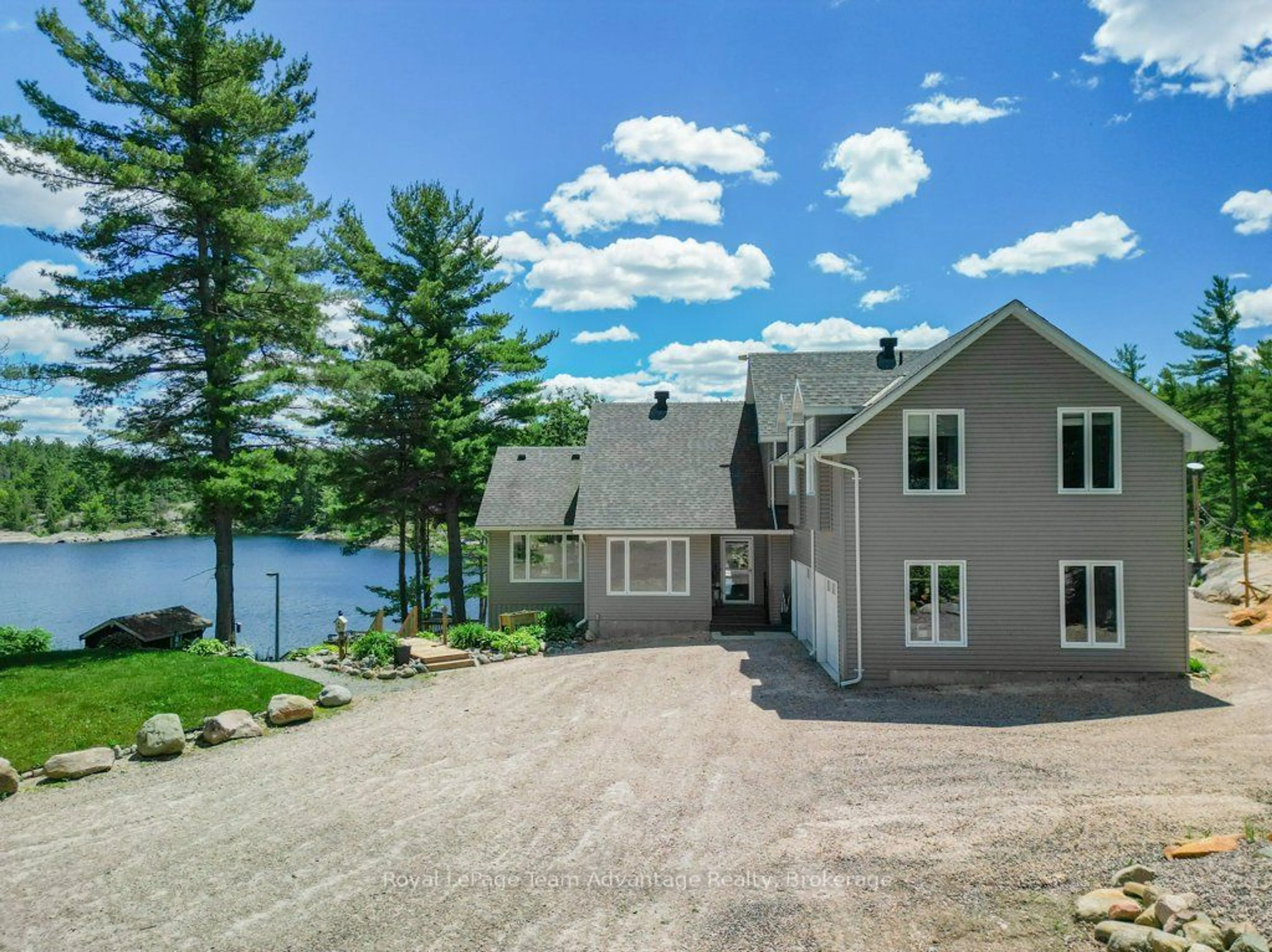 A pic from outside/outdoor area/front of a property/back of a property/a pic from drone, water/lake/river/ocean view for 254 G XBay Rd, Killarney Ontario P0M 1A0