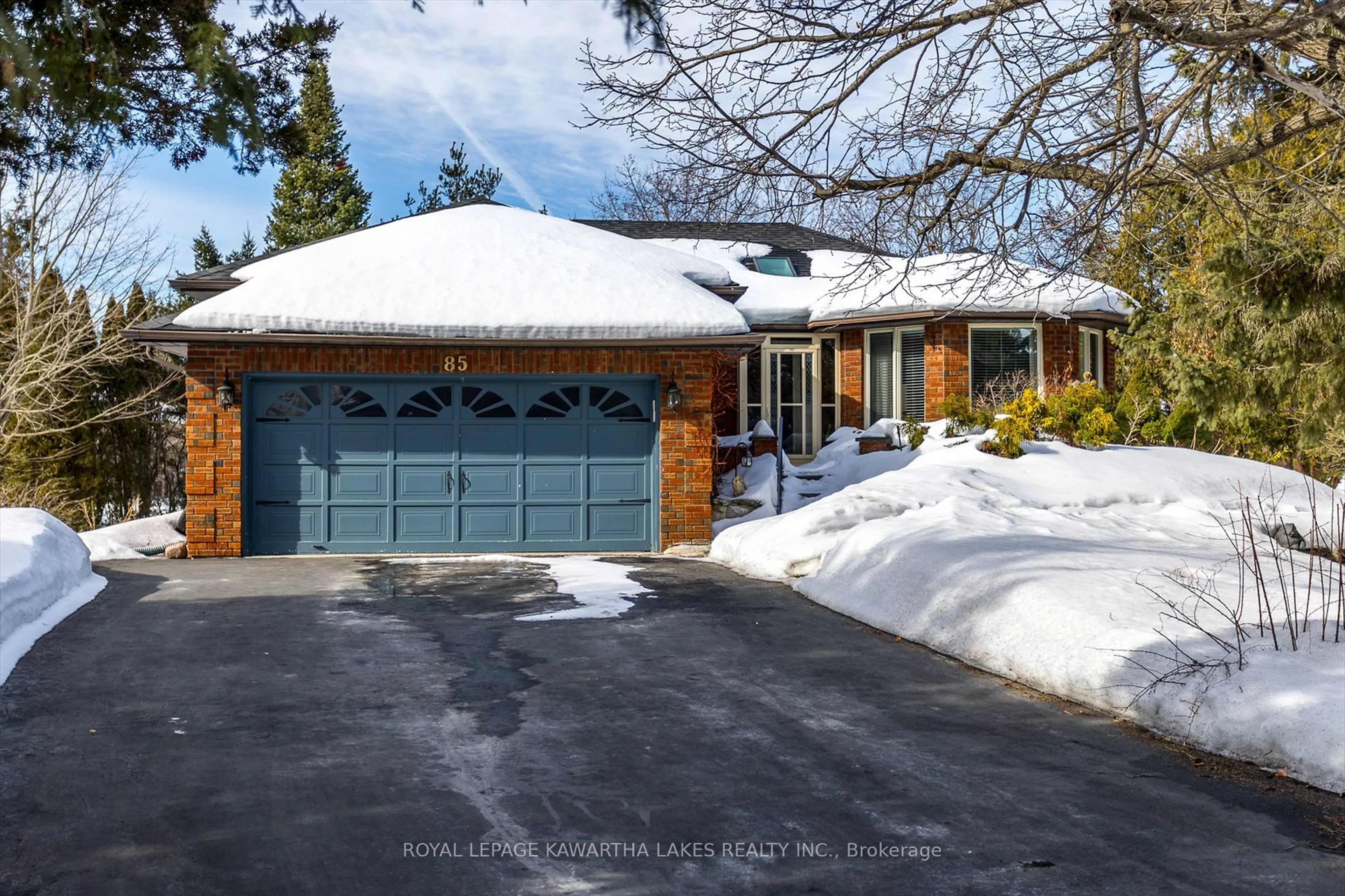 Home with brick exterior material, street for 85 Navigators Tr, Kawartha Lakes Ontario K0M 1A0