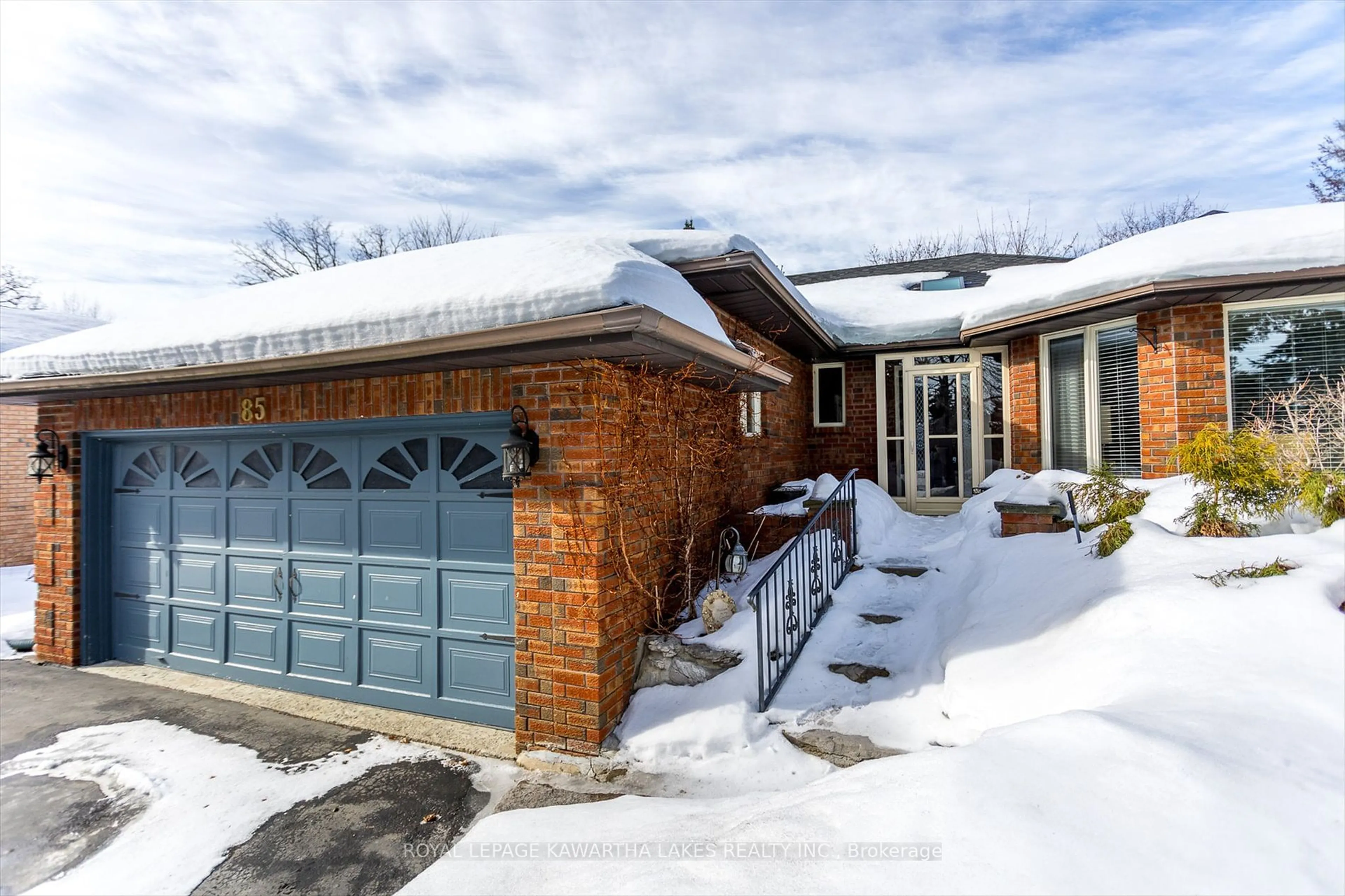 Home with brick exterior material, street for 85 Navigators Tr, Kawartha Lakes Ontario K0M 1A0