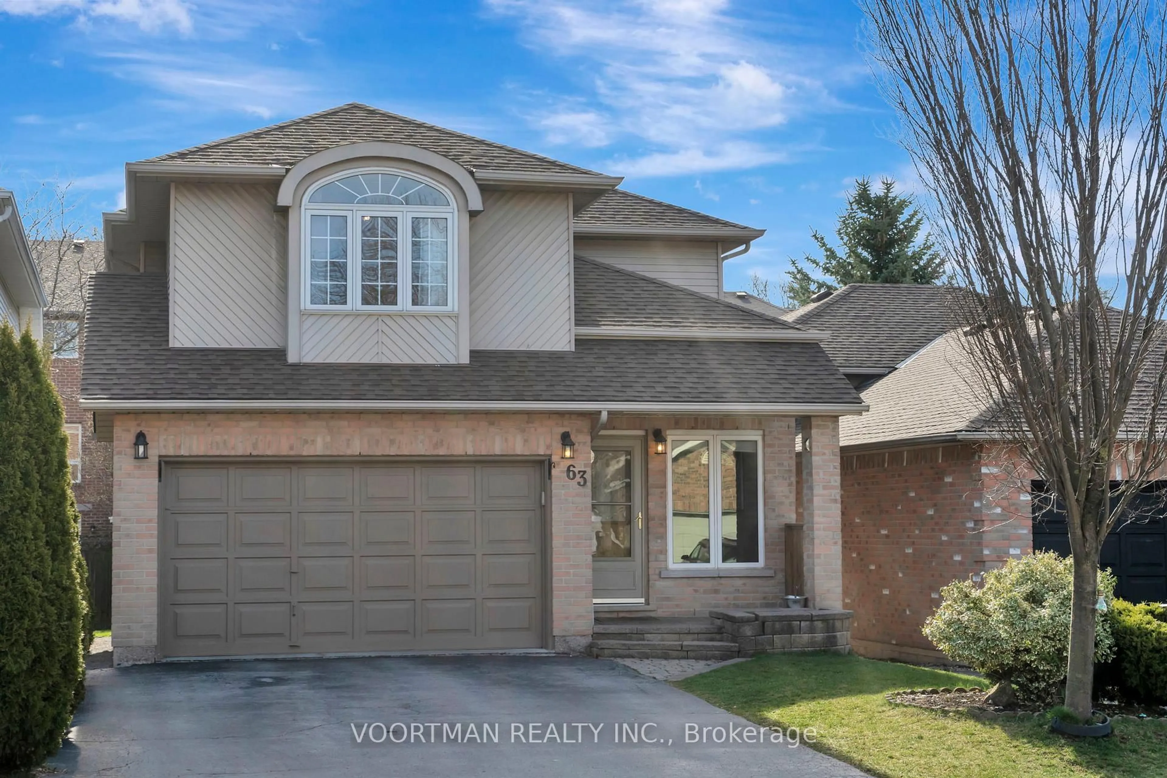 Home with brick exterior material, mountain view for 63 Lynnette Dr, Hamilton Ontario L9B 2J7