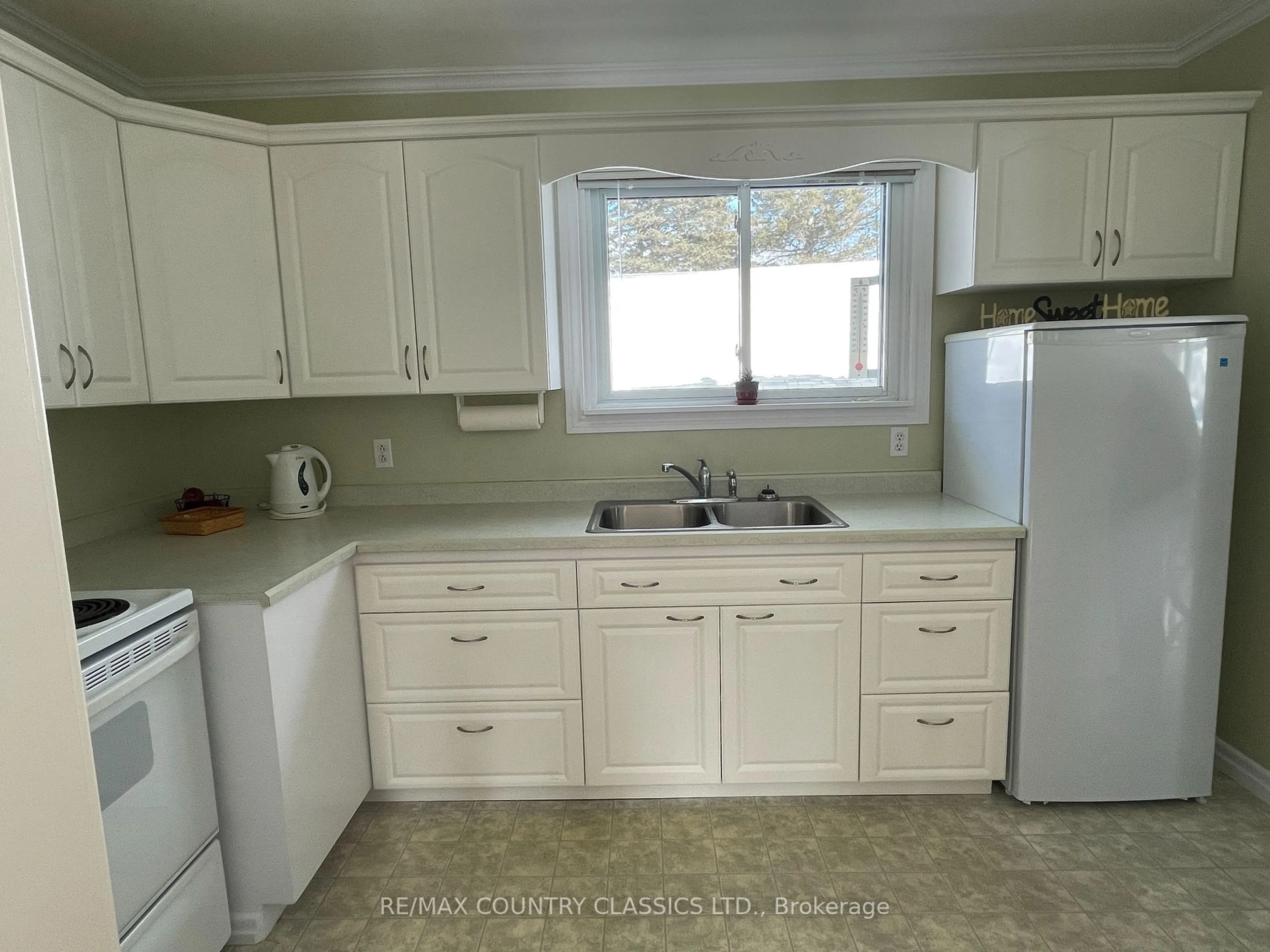 Standard kitchen, ceramic/tile floor for 34 Great Oak St, Highlands East Ontario K0L 1M0