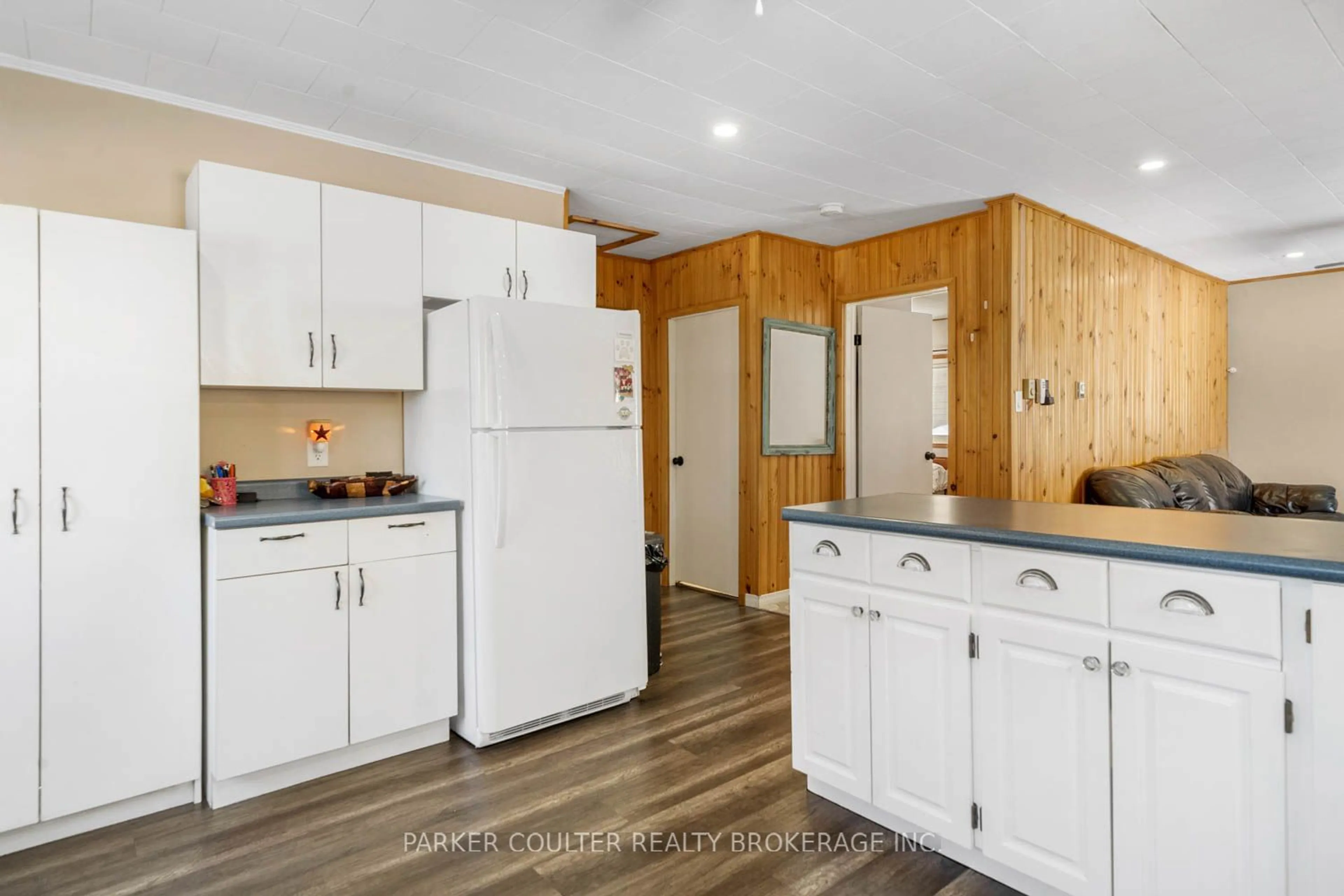 Open concept kitchen, wood/laminate floor for 10 Hanna Rd, Parry Sound Ontario P2A 1R2