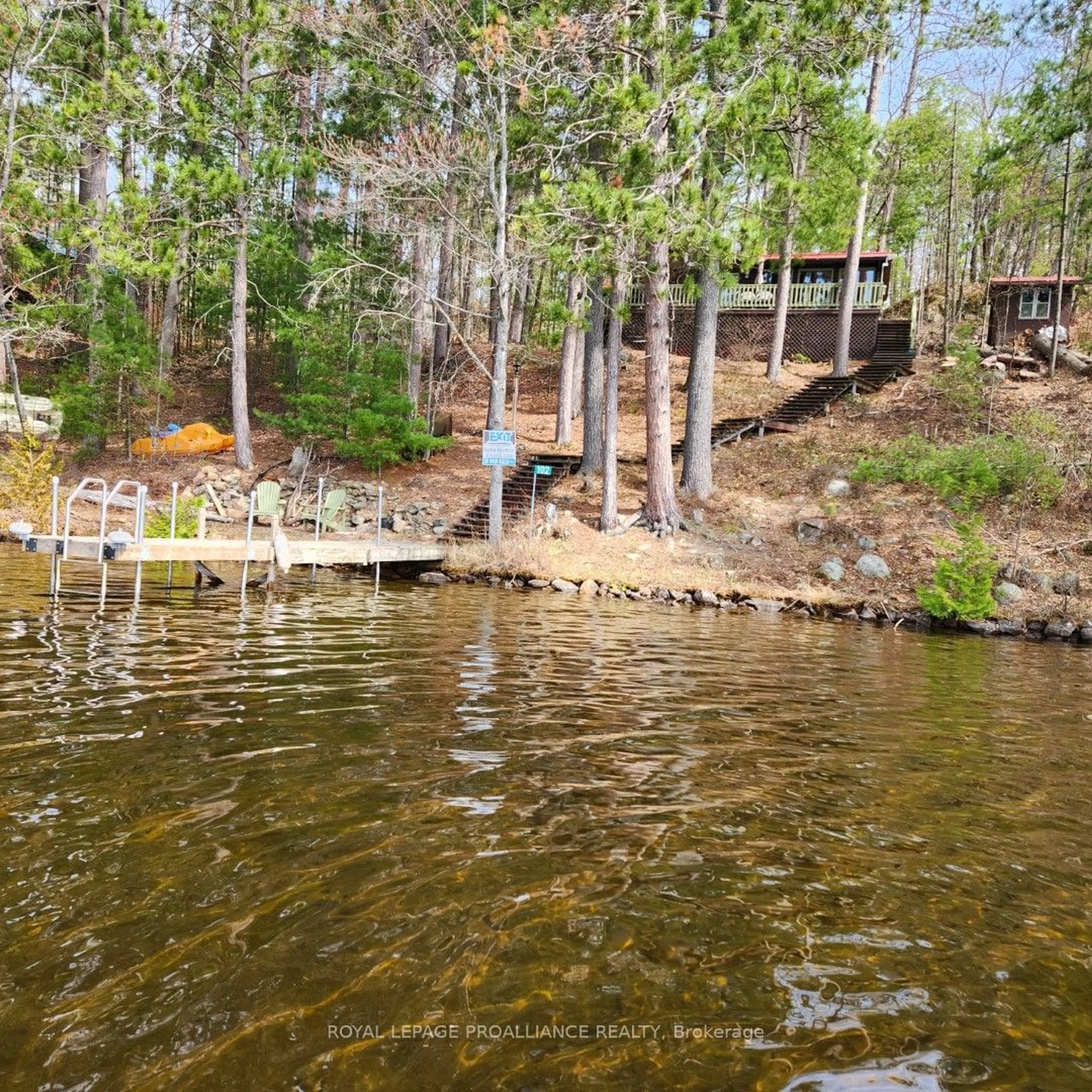 A pic from outside/outdoor area/front of a property/back of a property/a pic from drone, water/lake/river/ocean view for 102 Mazinaw Lake, Addington Highlands Ontario K0H 1K0