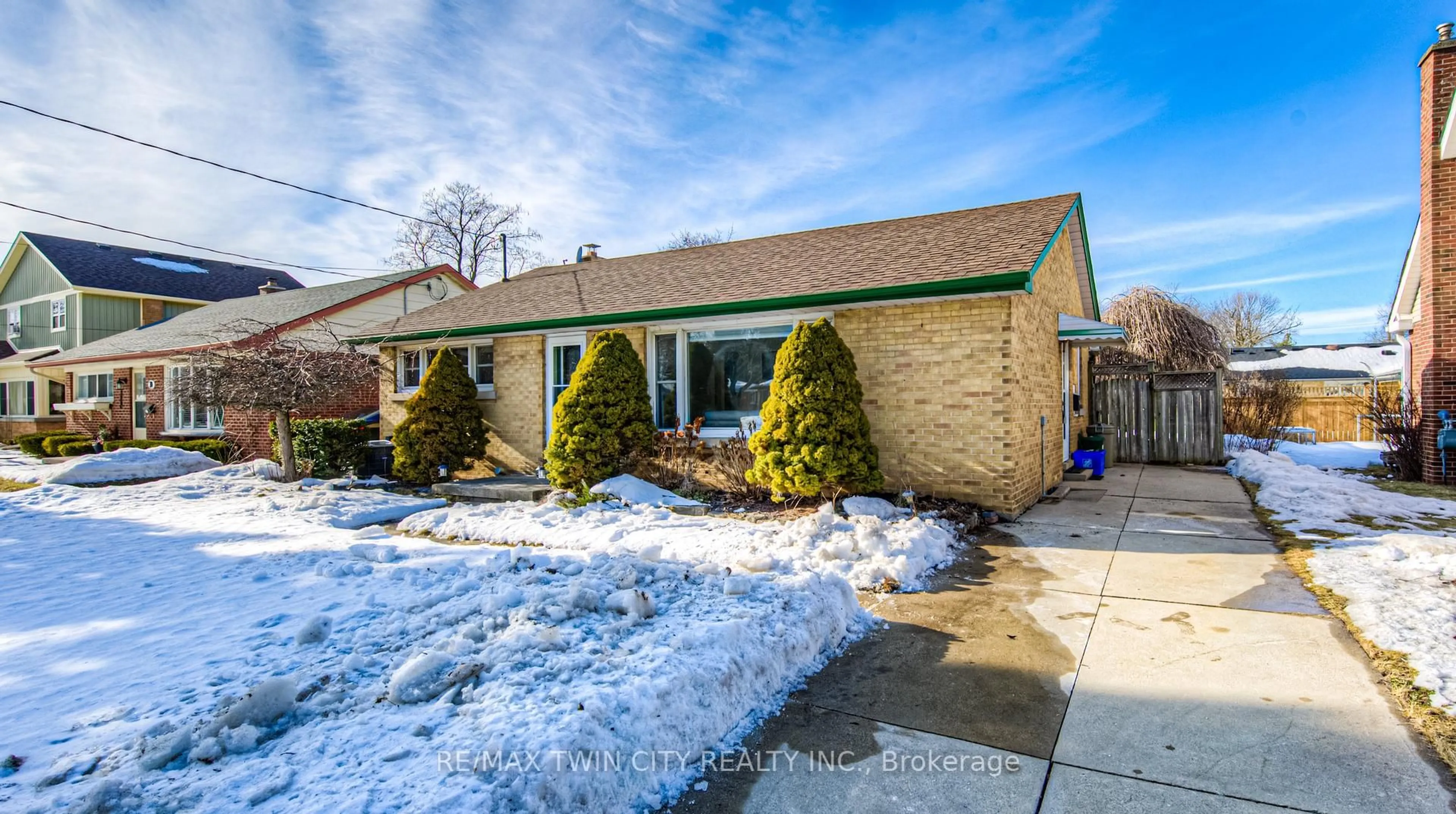 Home with brick exterior material, street for 74 Chelsea Rd, Kitchener Ontario N2B 1H9