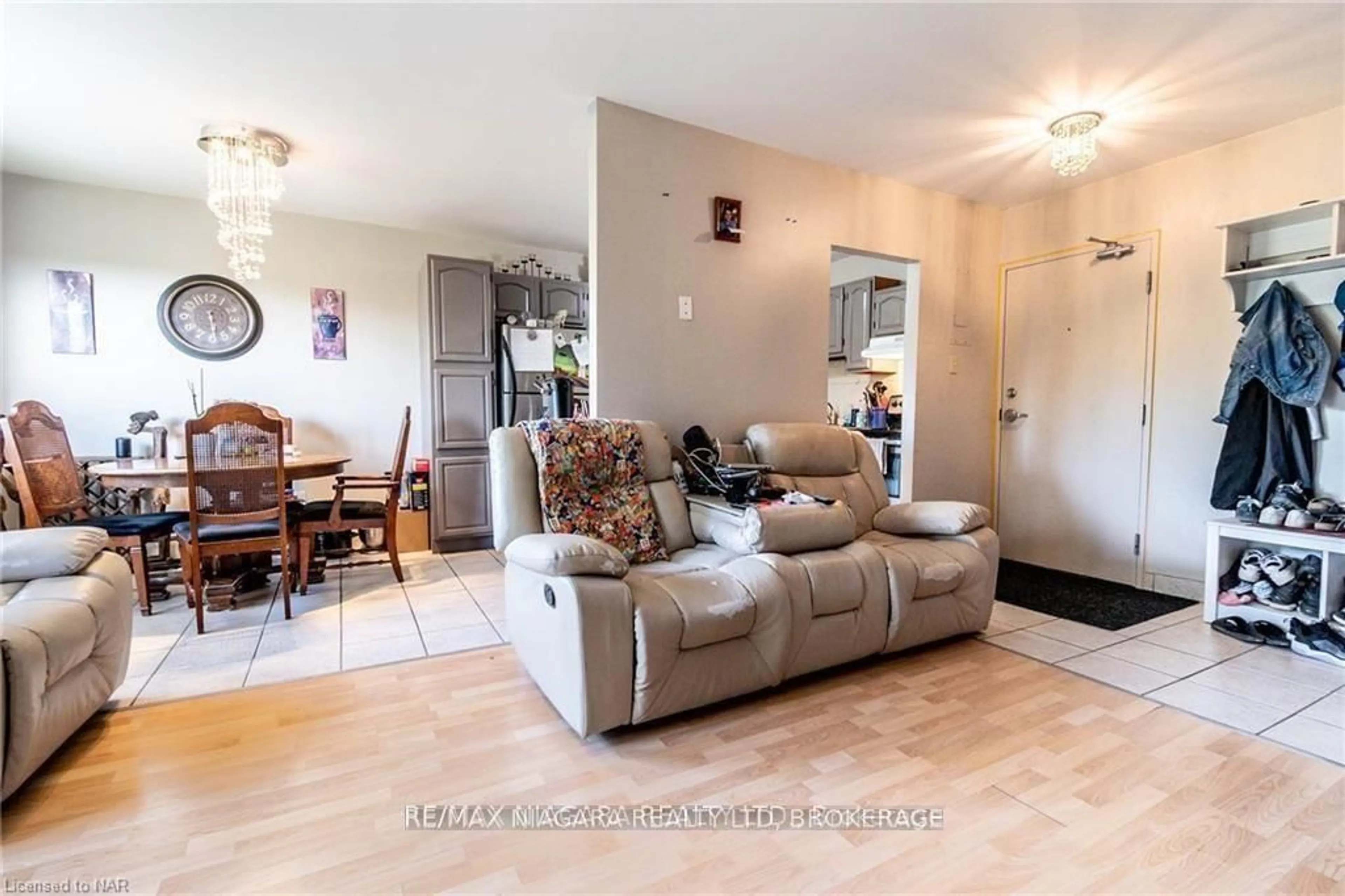 Living room with furniture, unknown for 242 OAKDALE Ave #317, St. Catharines Ontario L2P 3K5