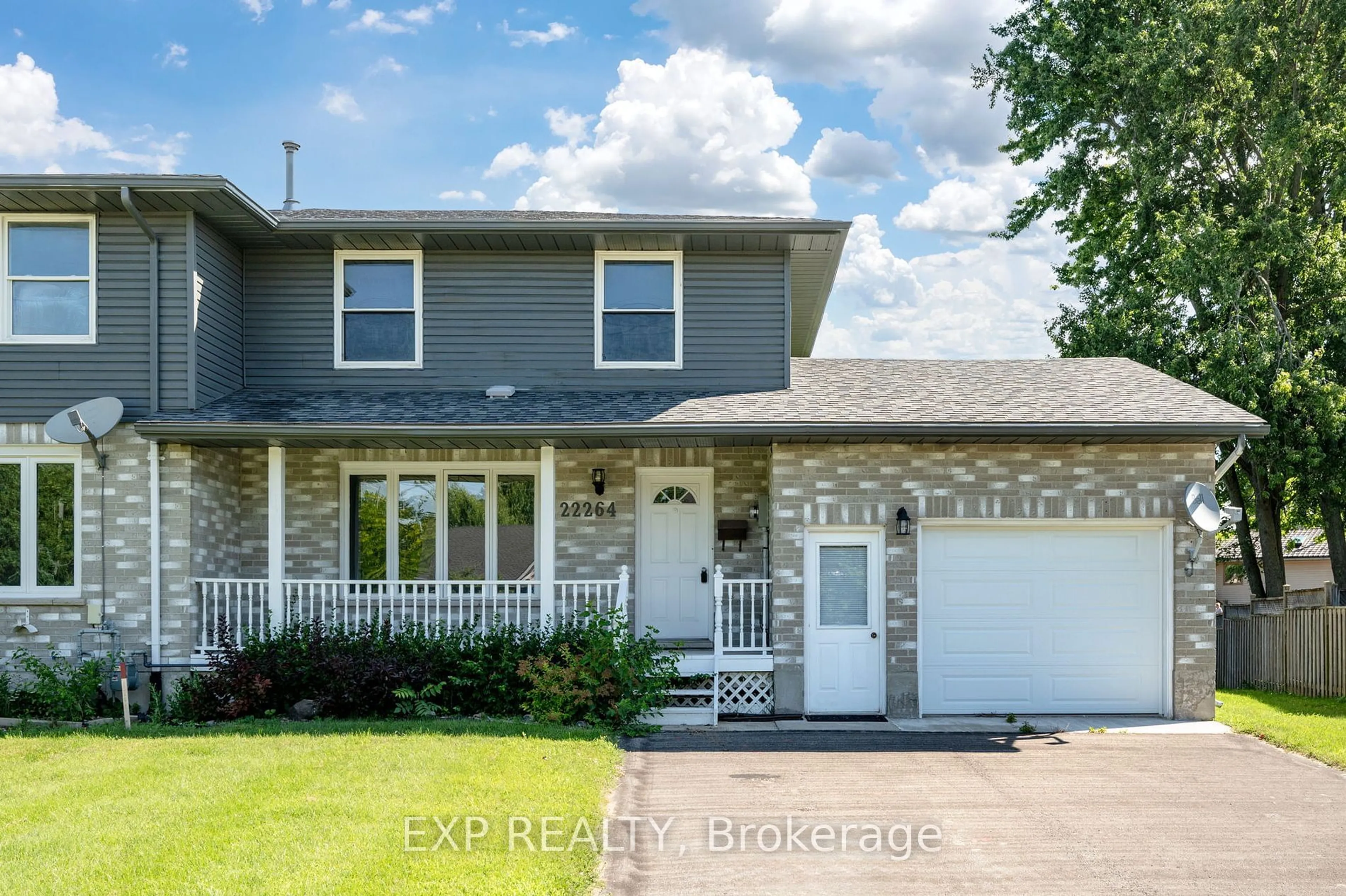 Home with vinyl exterior material, street for 22264 ADELAIDE St, Strathroy-Caradoc Ontario N0L 1W0