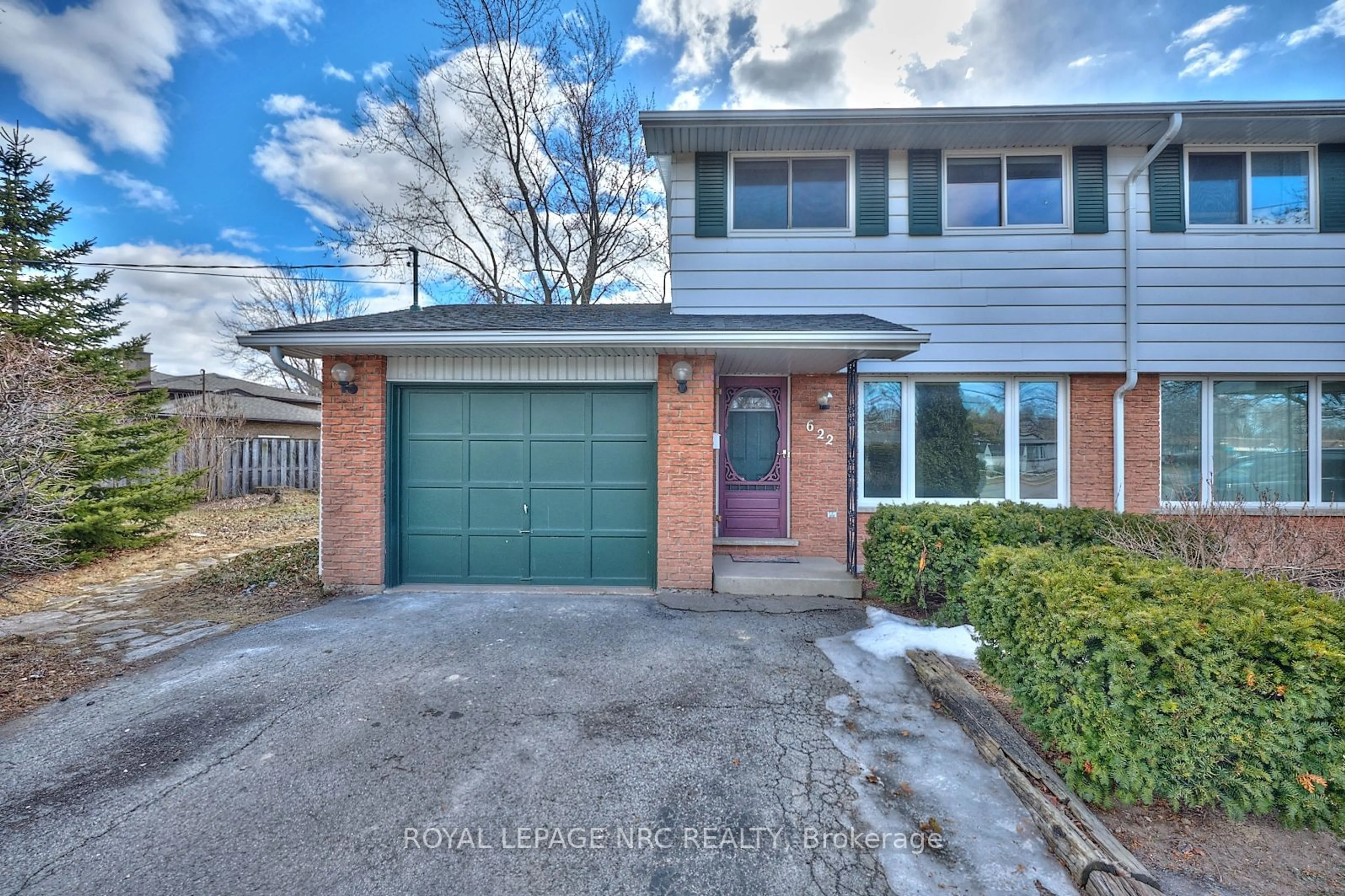 Home with brick exterior material, street for 622 Carlton St, St. Catharines Ontario L2M 6Z1