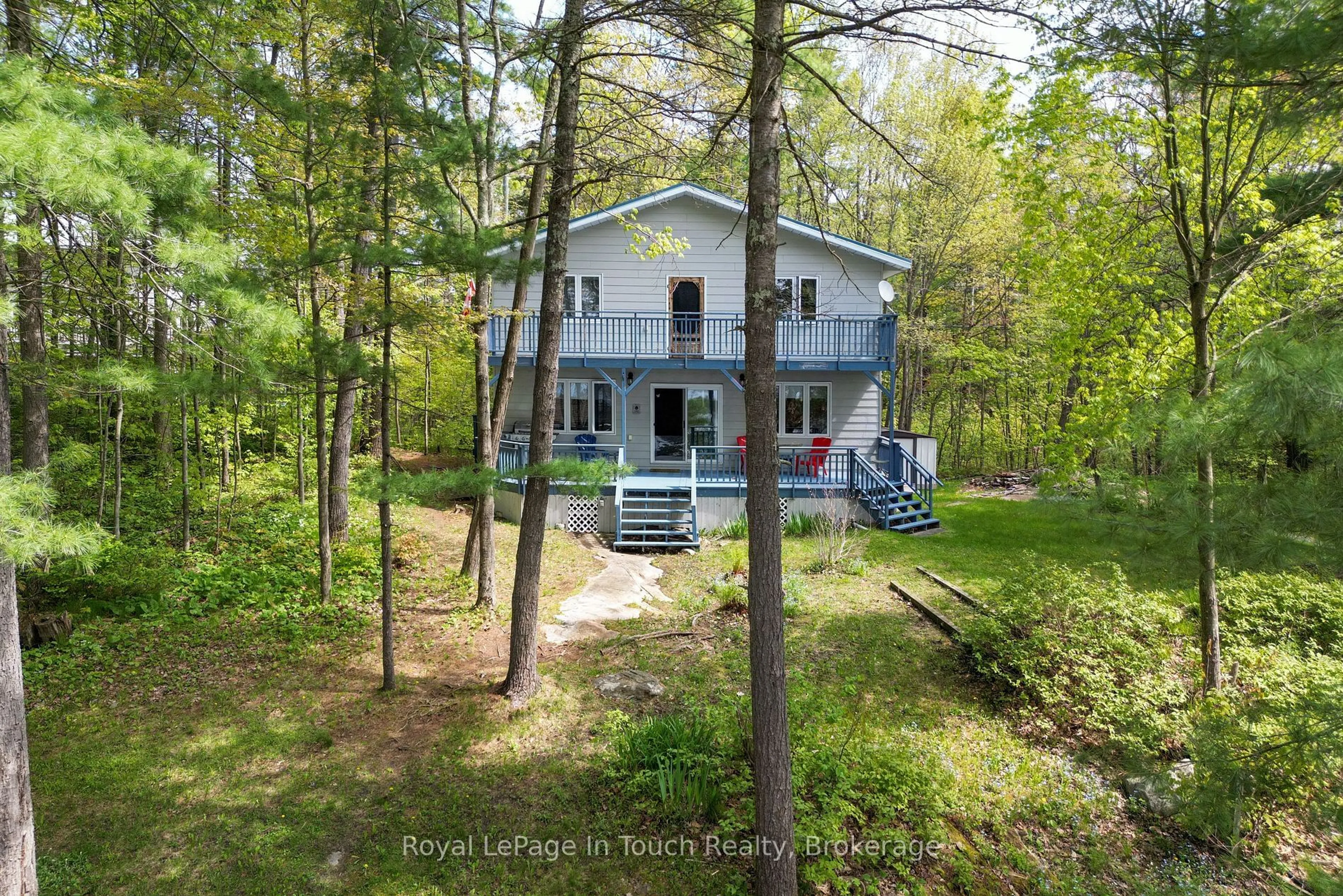 A pic from outside/outdoor area/front of a property/back of a property/a pic from drone, water/lake/river/ocean view for 10080 Georgian Bay Shore, Georgian Bay Ontario P0E 1E0