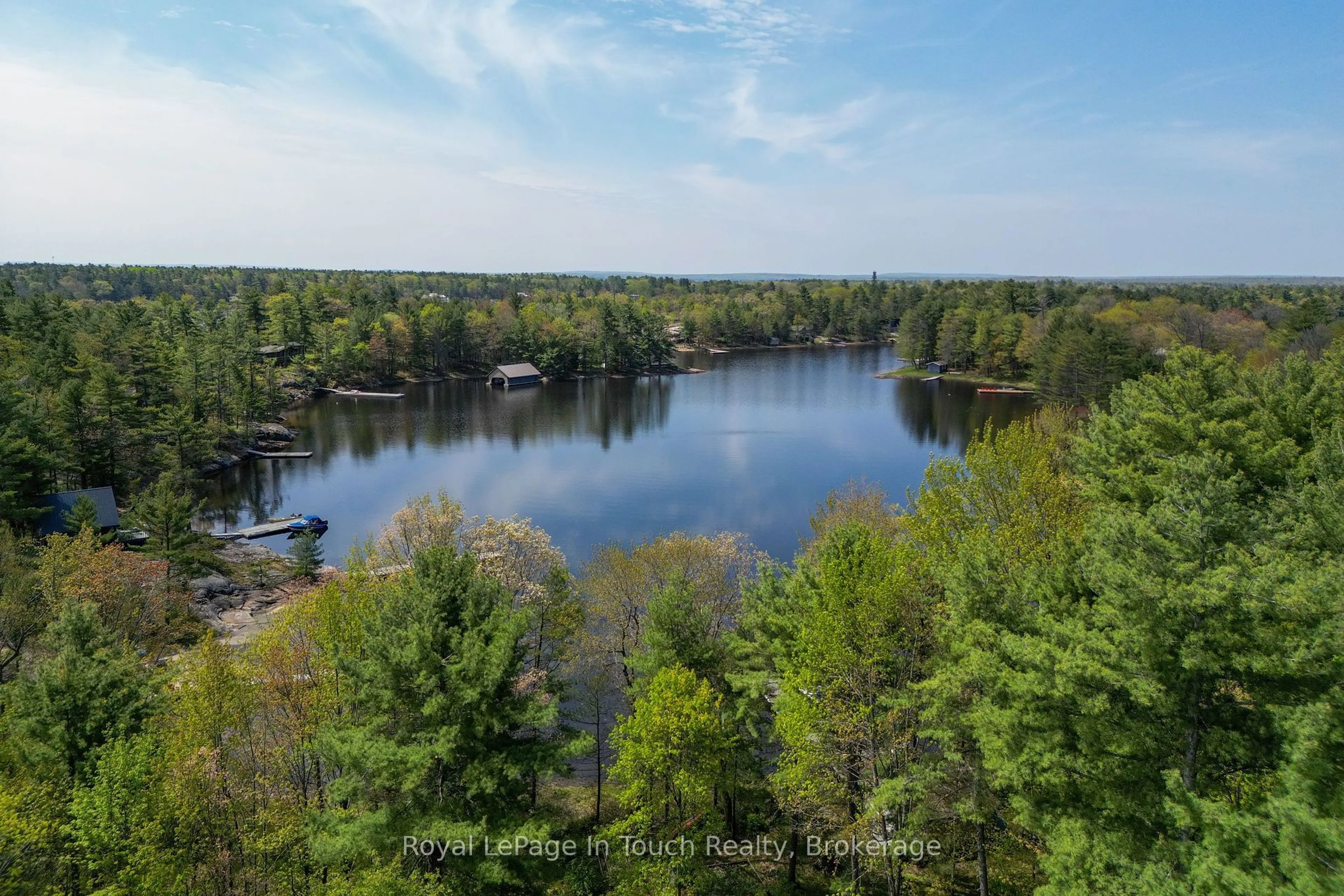 A pic from outside/outdoor area/front of a property/back of a property/a pic from drone, water/lake/river/ocean view for 10080 Georgian Bay Shore, Georgian Bay Ontario P0E 1E0