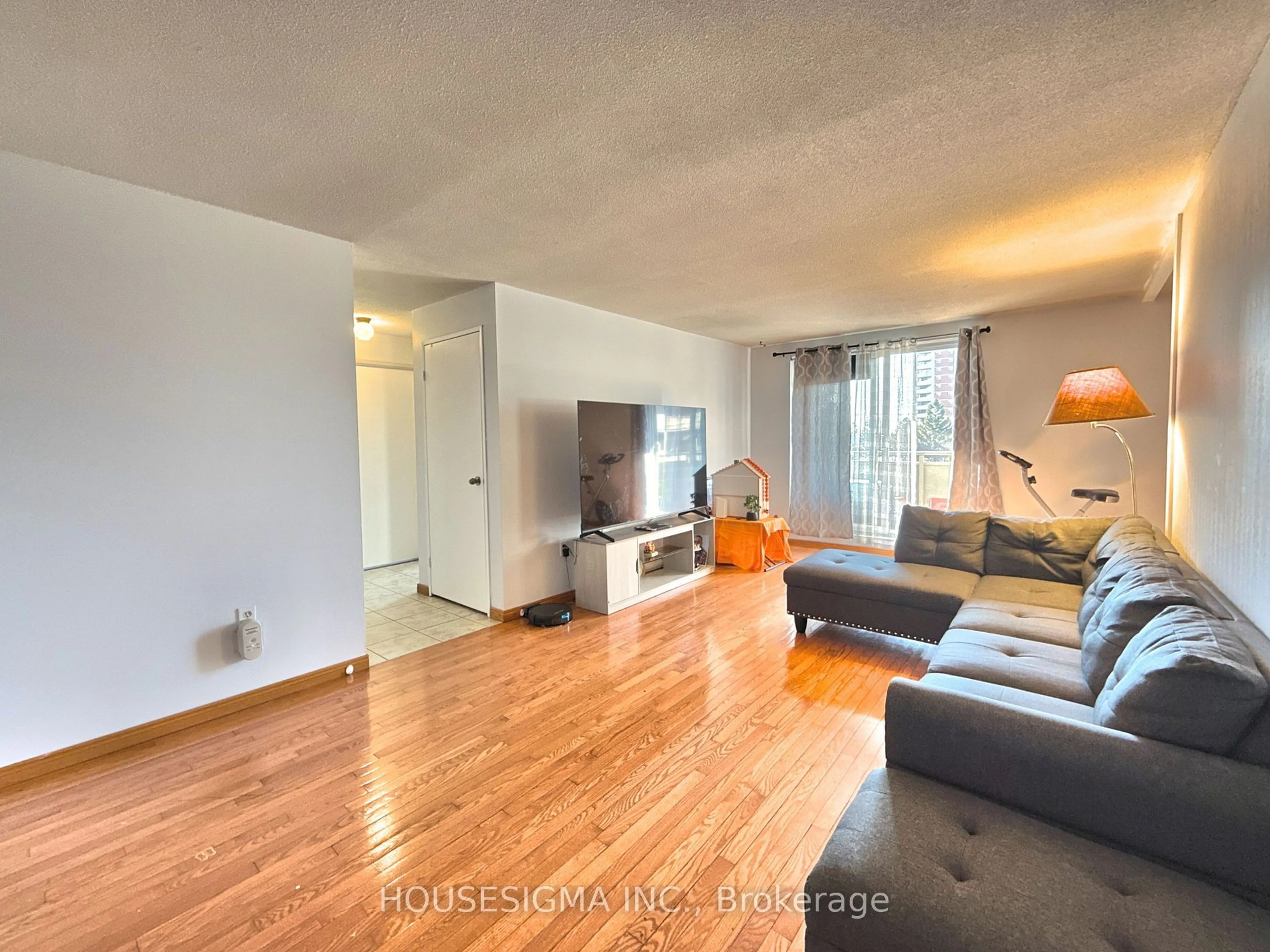 Living room with furniture, wood/laminate floor for 1104 Jalna Blvd #401, London Ontario N6E 2S6