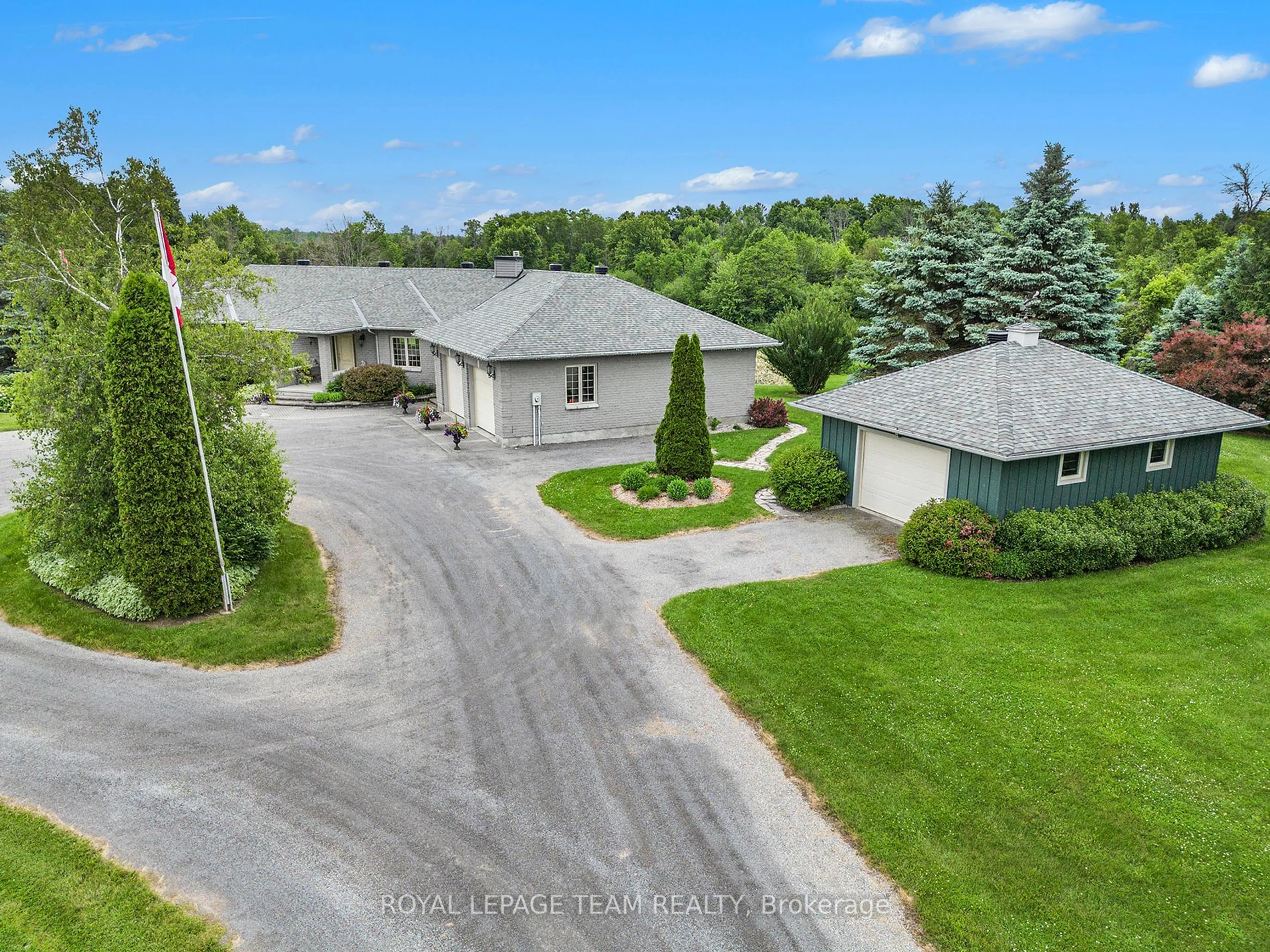 A pic from outside/outdoor area/front of a property/back of a property/a pic from drone, street for 2124 Cty Rd 18 Rd, North Grenville Ontario K0G 1J0