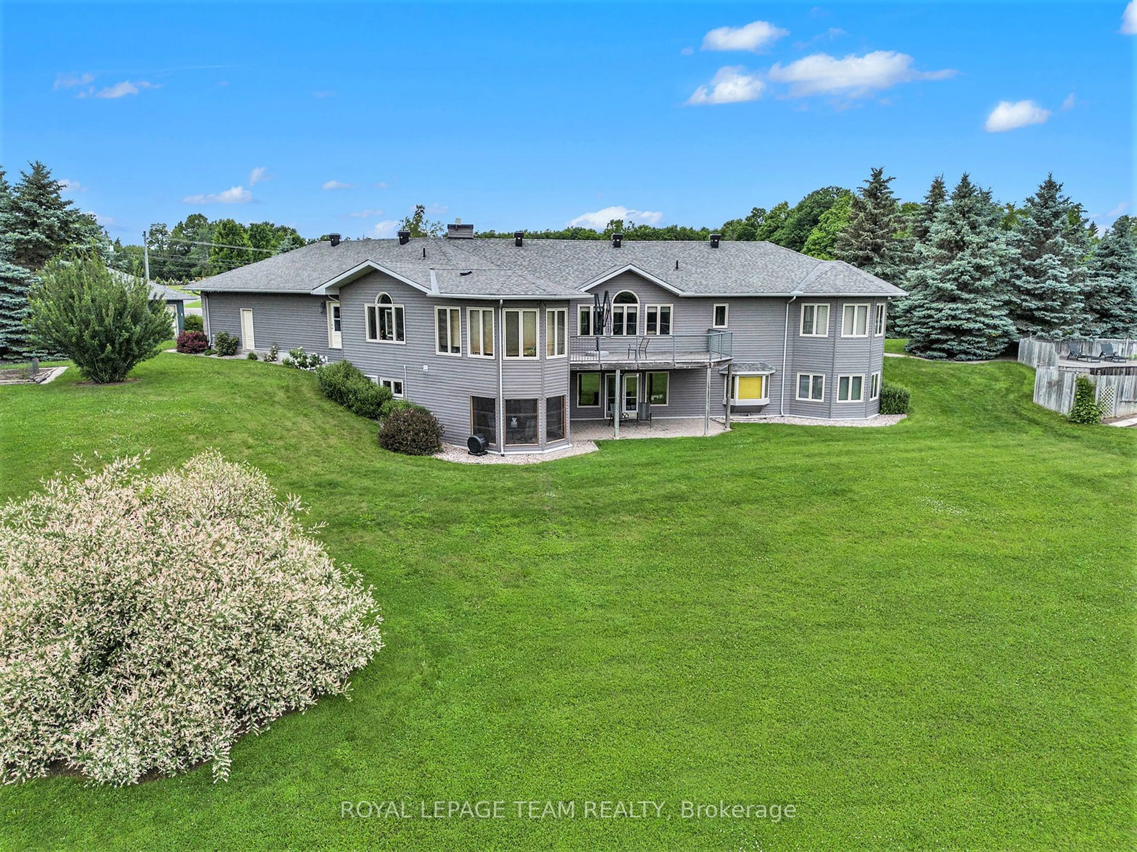 A pic from outside/outdoor area/front of a property/back of a property/a pic from drone, water/lake/river/ocean view for 2124 Cty Rd 18 Rd, North Grenville Ontario K0G 1J0