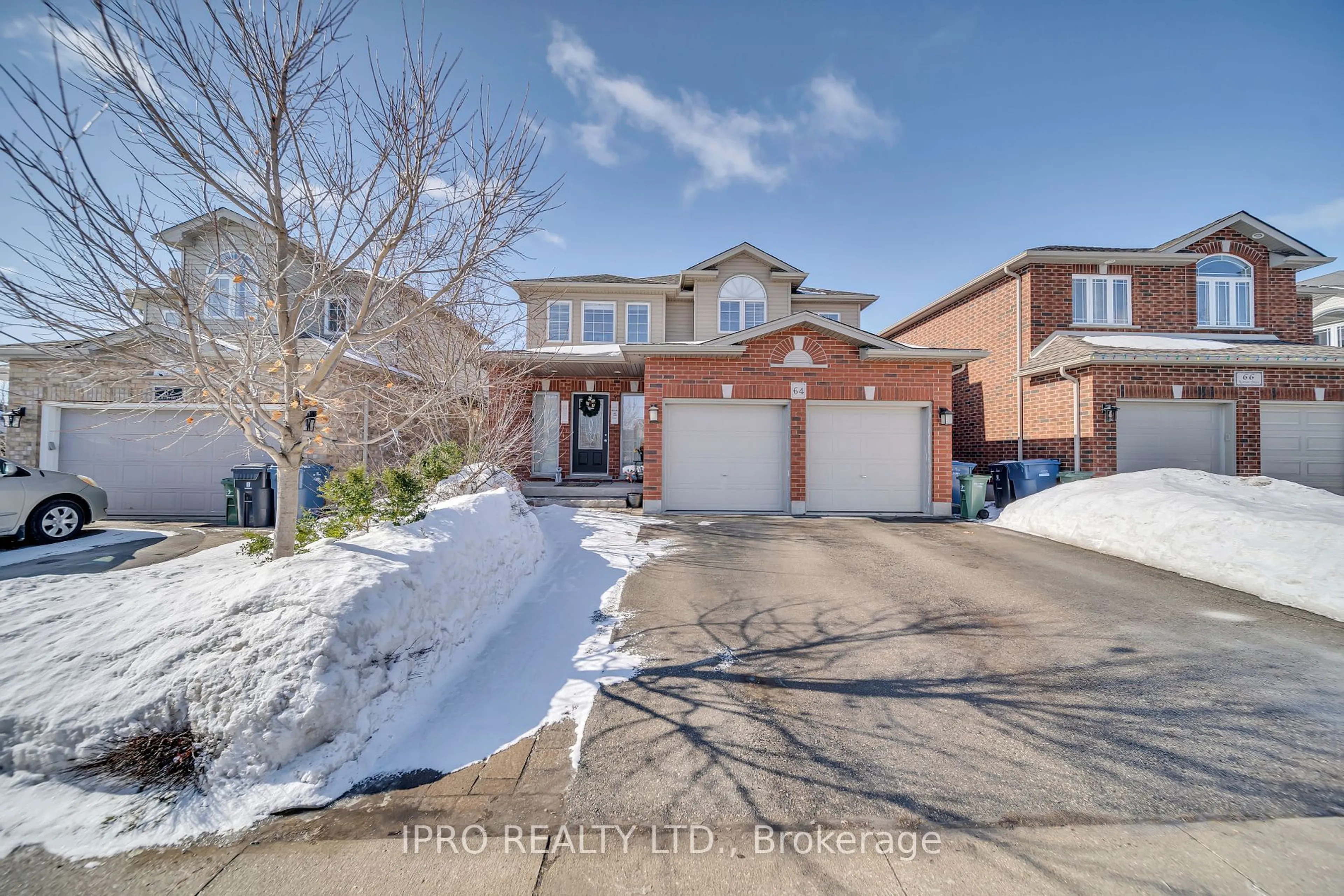 Home with brick exterior material, street for 64 Norton Dr, Guelph Ontario N1E 7K8