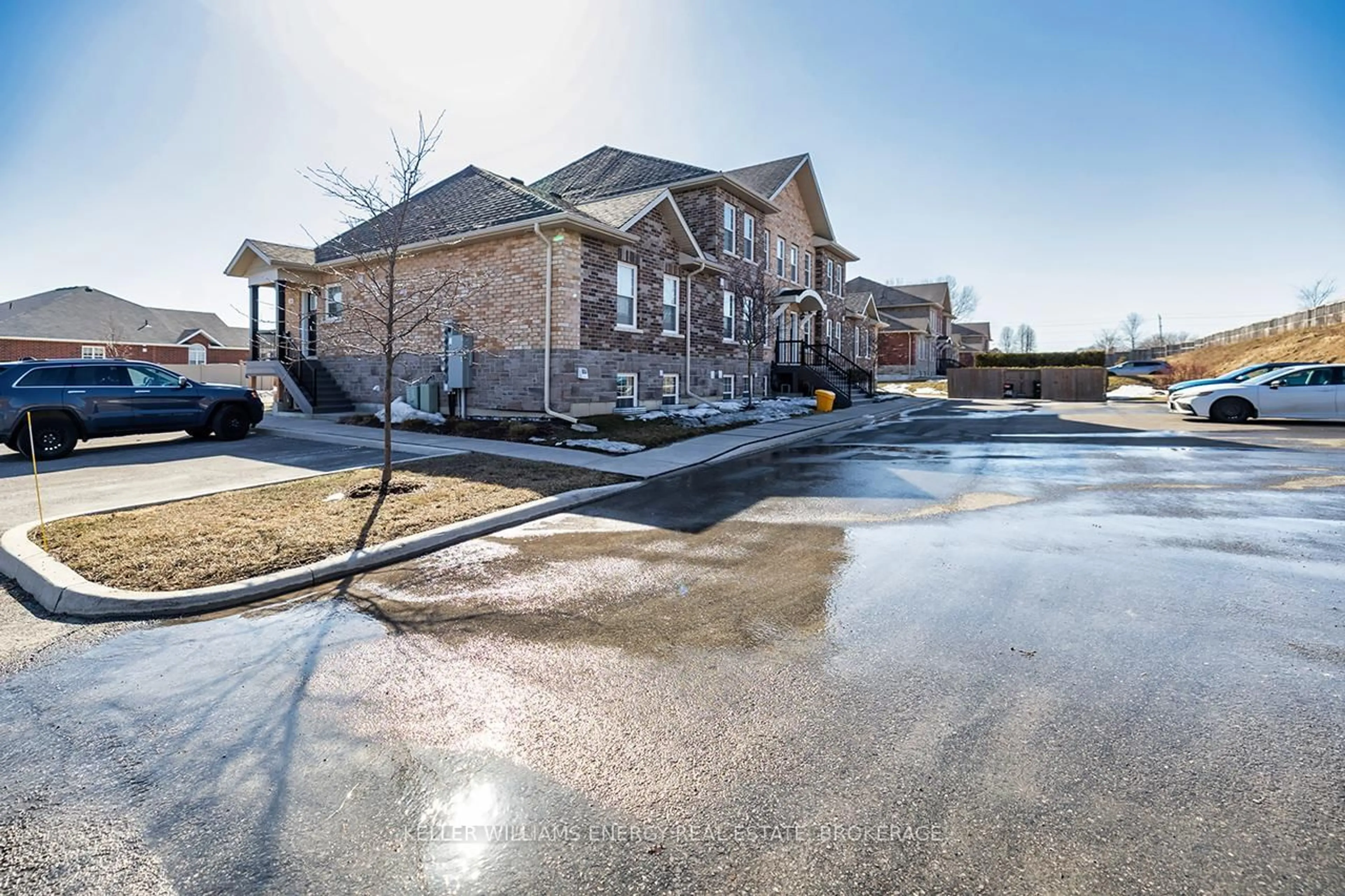 A pic from outside/outdoor area/front of a property/back of a property/a pic from drone, street for 450 Lonsberry Dr #310, Cobourg Ontario K9A 0K4