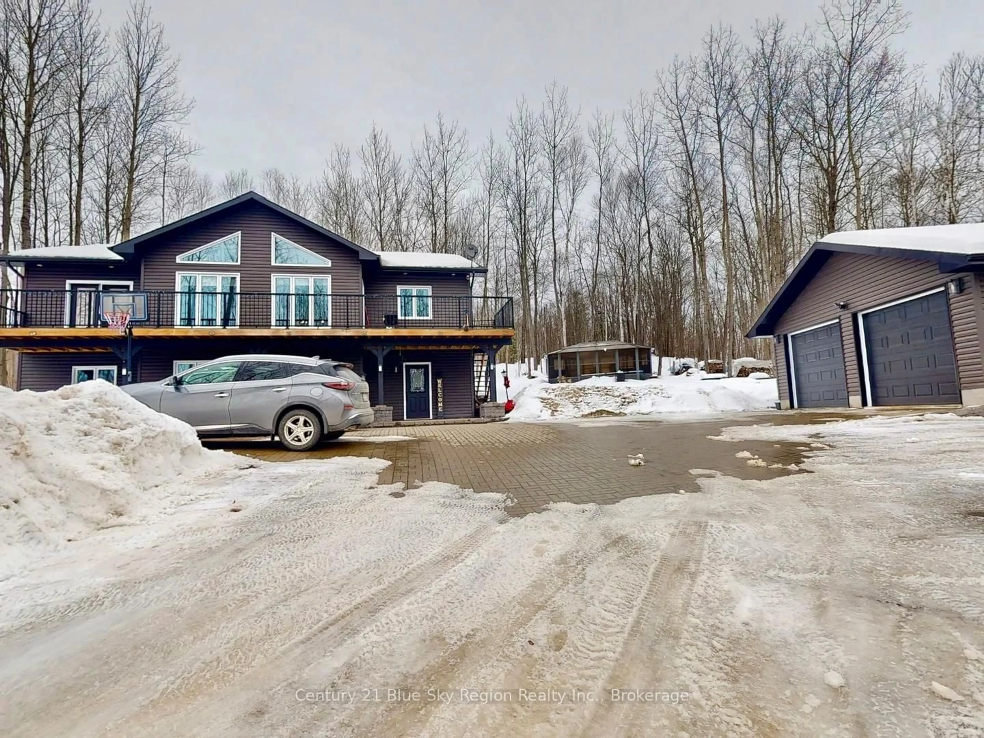 A pic from outside/outdoor area/front of a property/back of a property/a pic from drone, building for 1928 Village Rd, East Ferris Ontario P0H 1B0