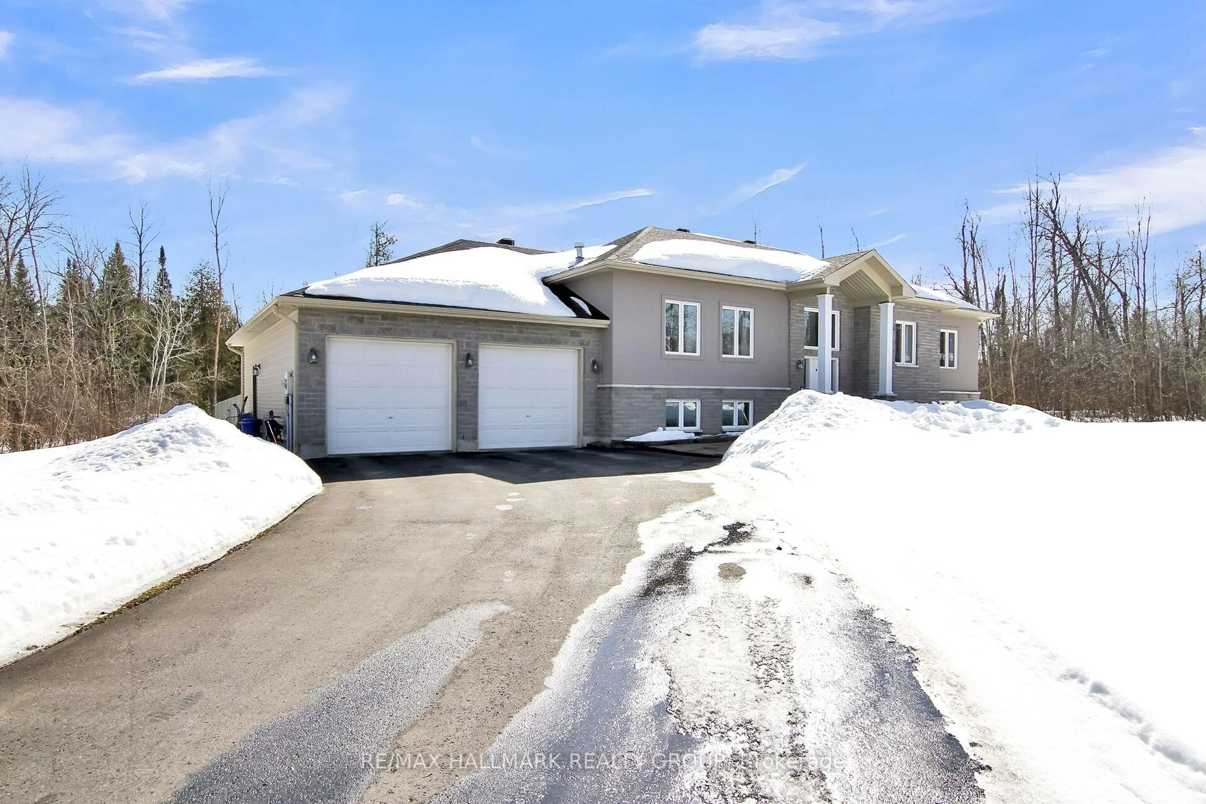 A pic from outside/outdoor area/front of a property/back of a property/a pic from drone, street for 172 Wilbert Cox Dr, Carp Ontario K0A 1L0