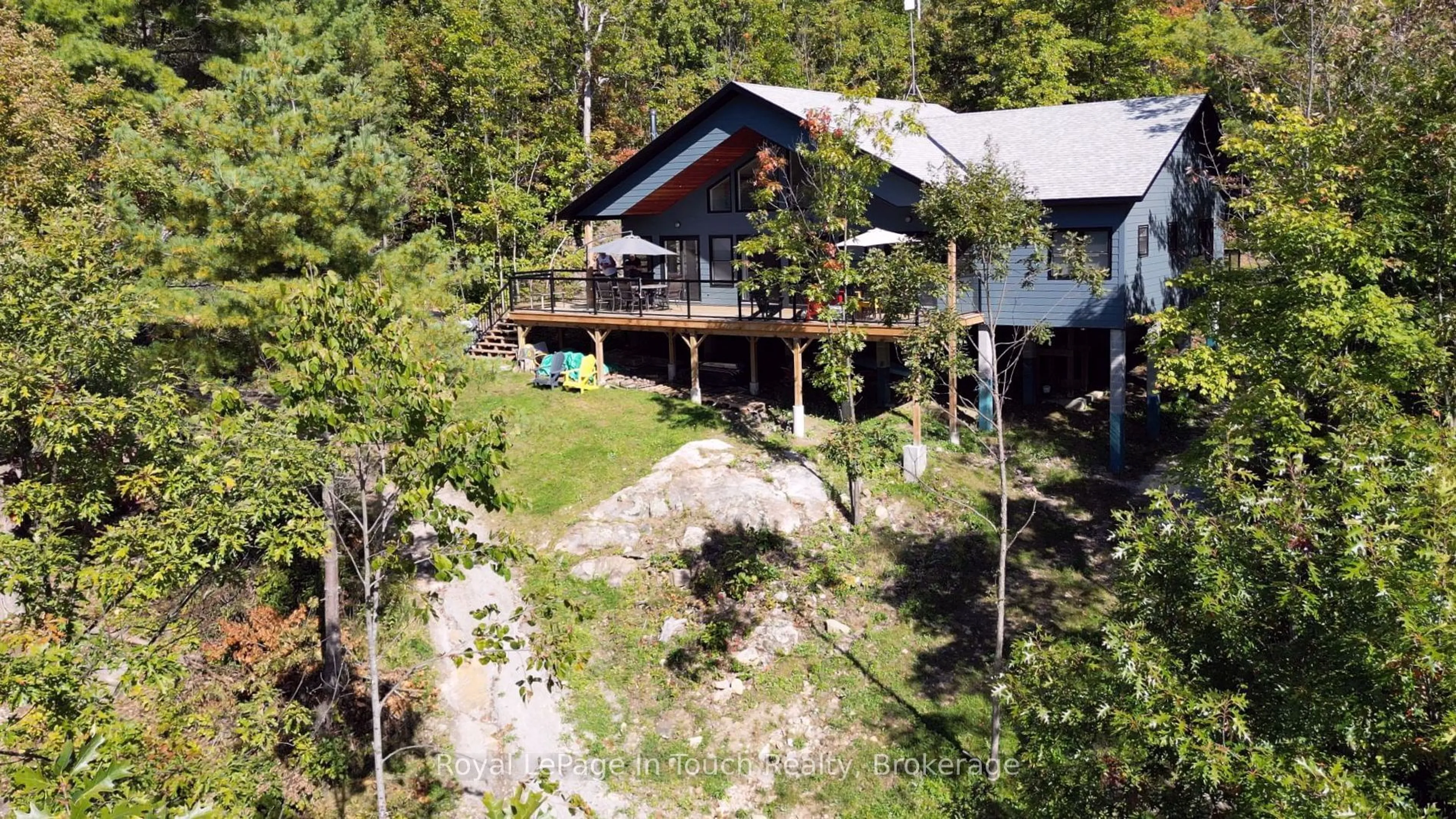 A pic from outside/outdoor area/front of a property/back of a property/a pic from drone, mountain view for 8814 Georgian Bay Shore, Georgian Bay Ontario P0E 1E0