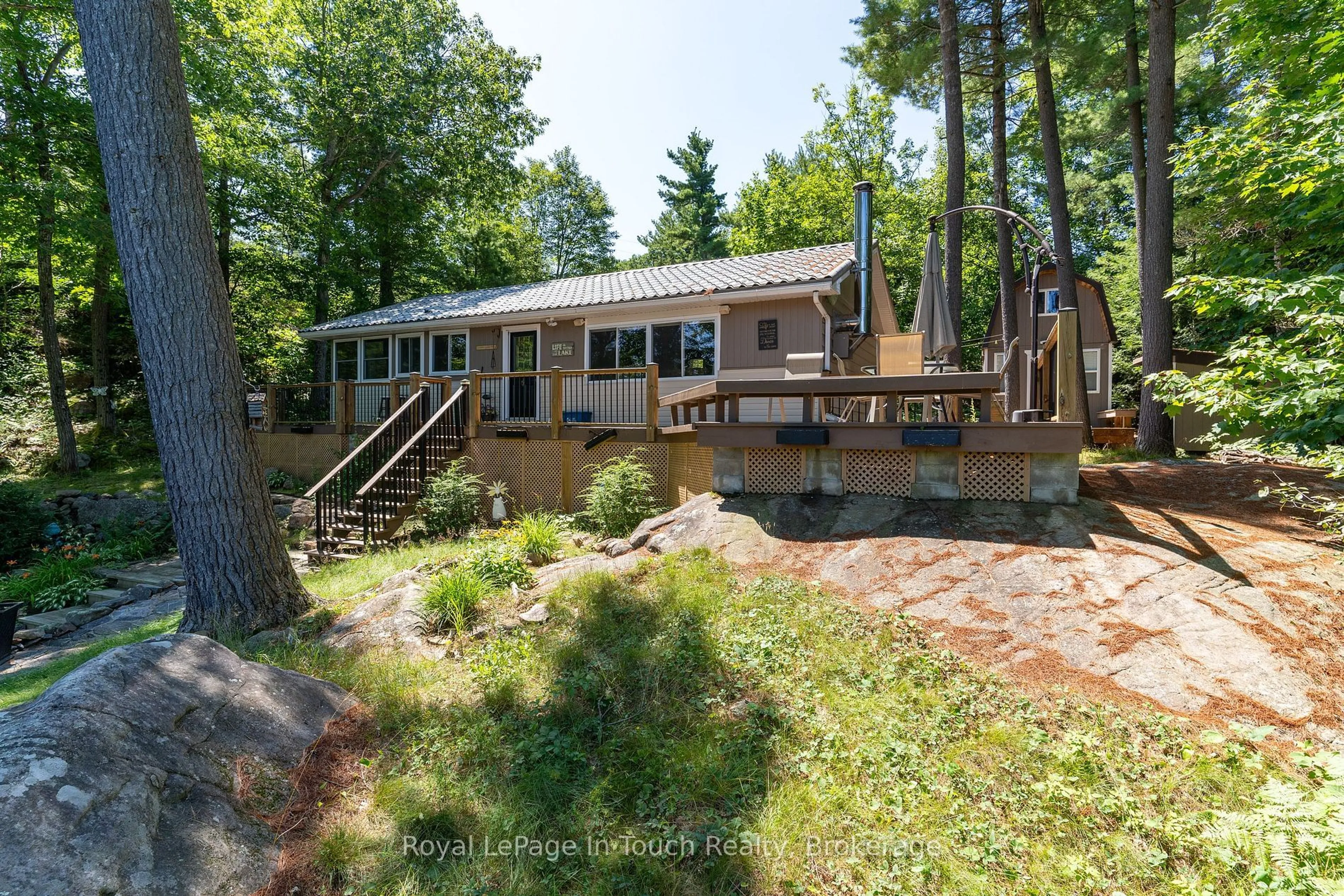 A pic from outside/outdoor area/front of a property/back of a property/a pic from drone, water/lake/river/ocean view for 1346 Island 980, Georgian Bay Ontario P0E 1E0